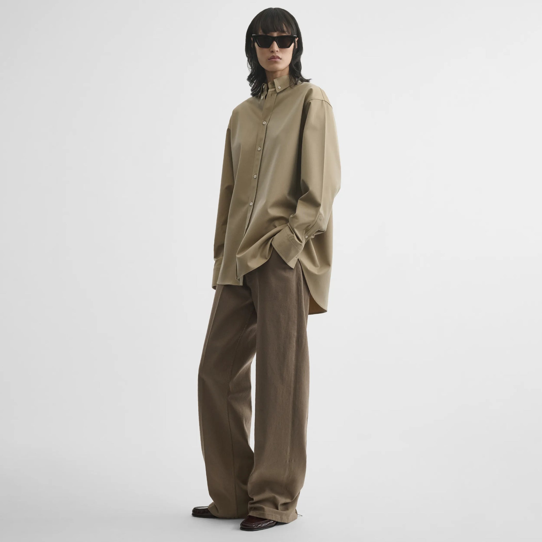 Front view of button collar shirt in trench cotton