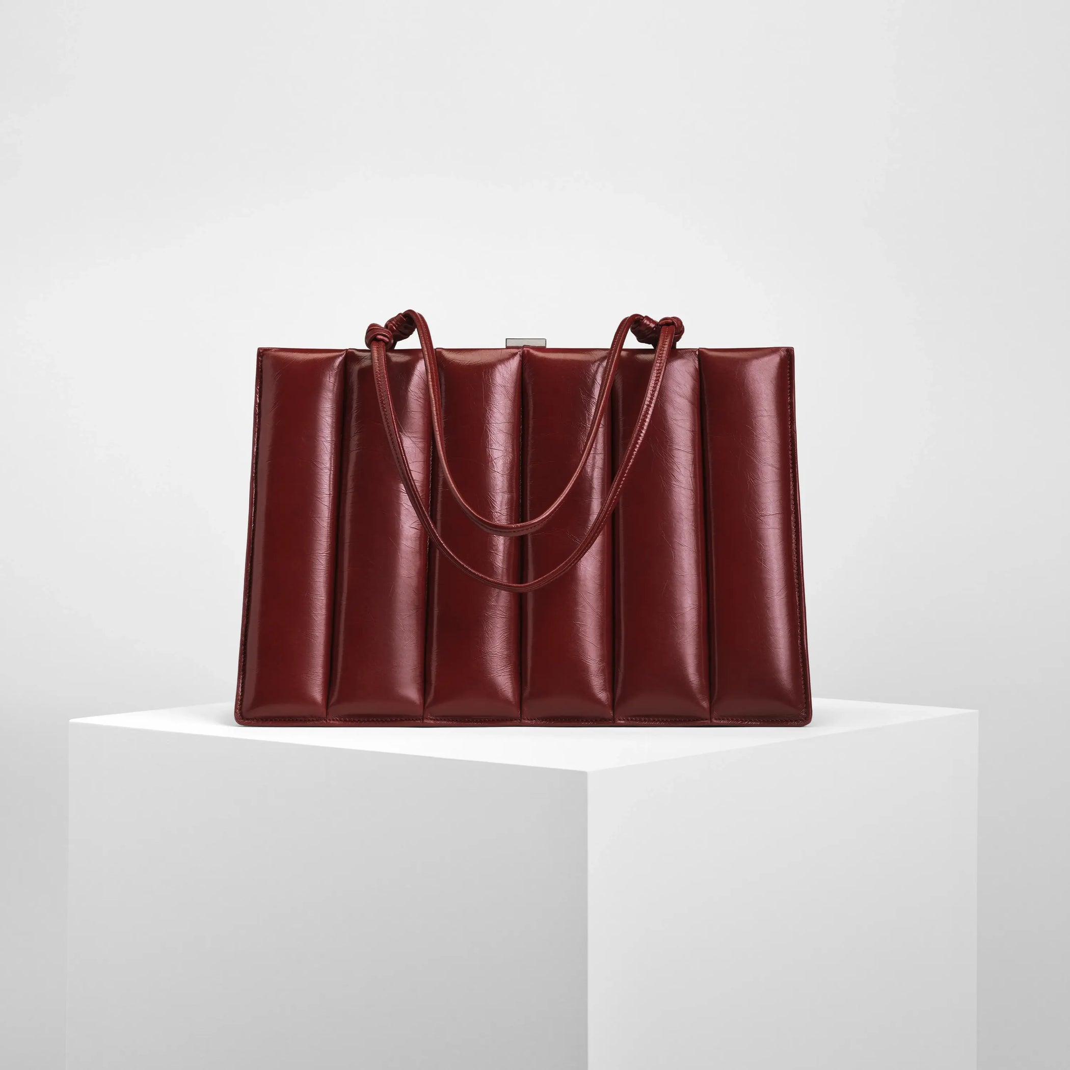 Front view of drive top handle bag medium in shiny calf red