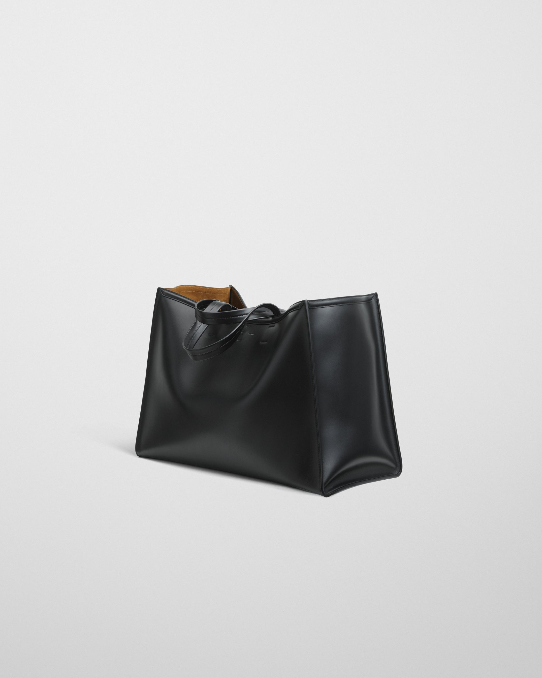 Side view of XL CABAS BAG in black leather