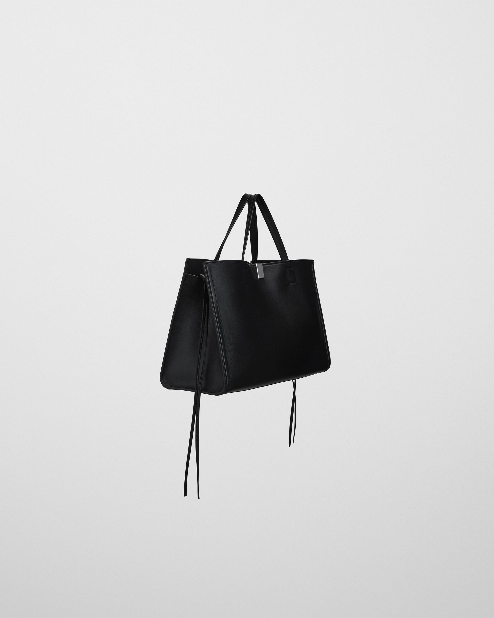Side view of MEDIUM KIT CABAS BAG in black leather
