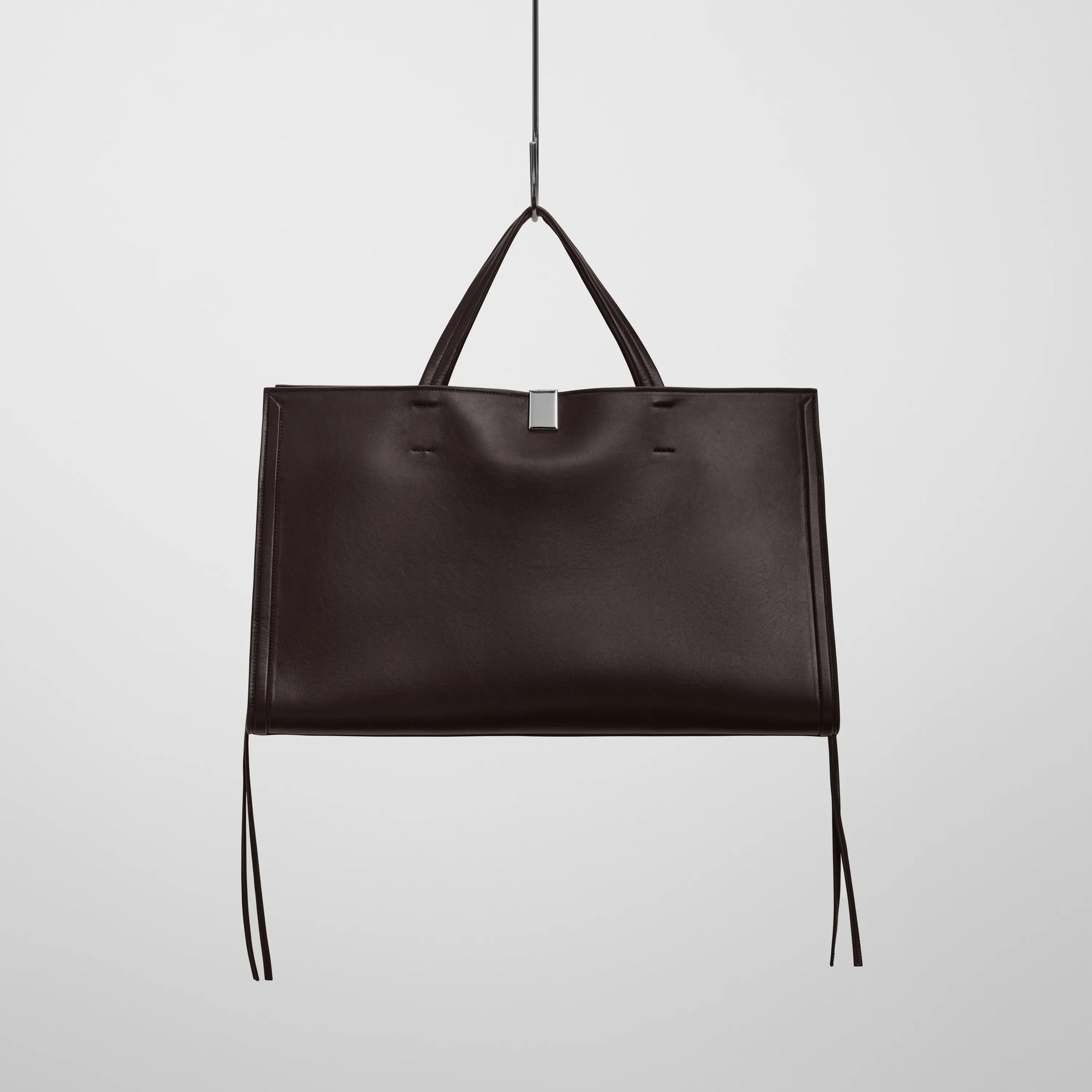 Front view of medium kit cabas in chocolate brown leather.