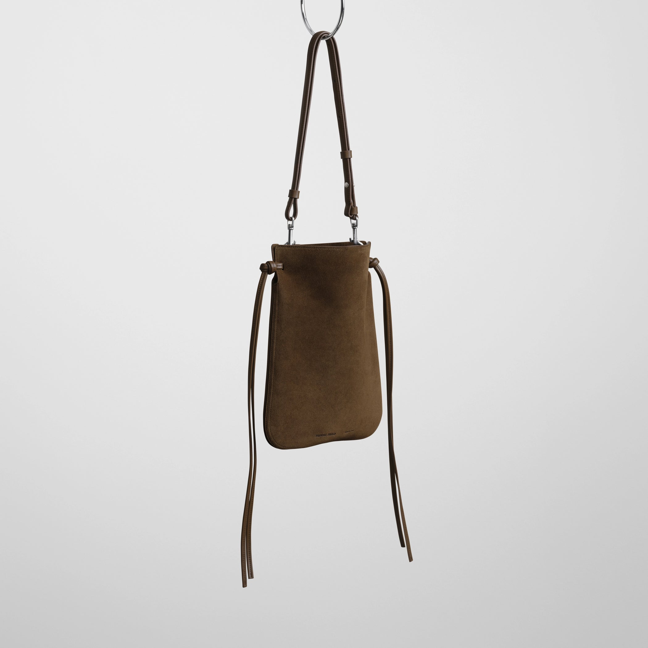 Angled front view of gig pouch in khaki leather