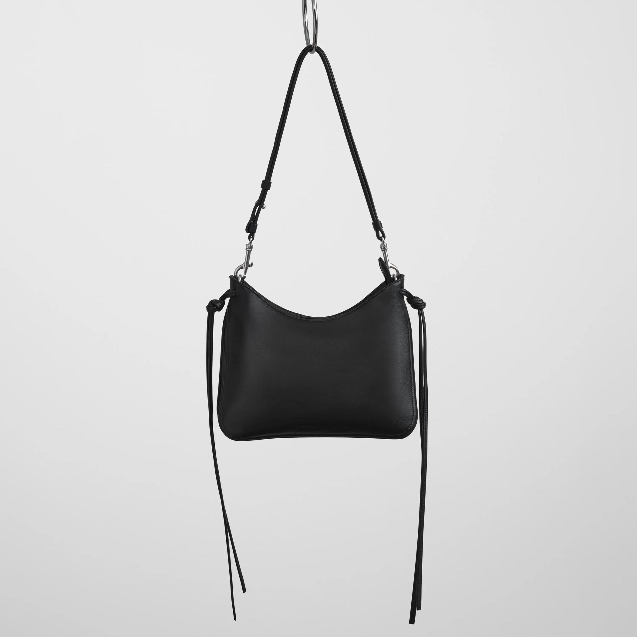 Front view of small gig in black leather