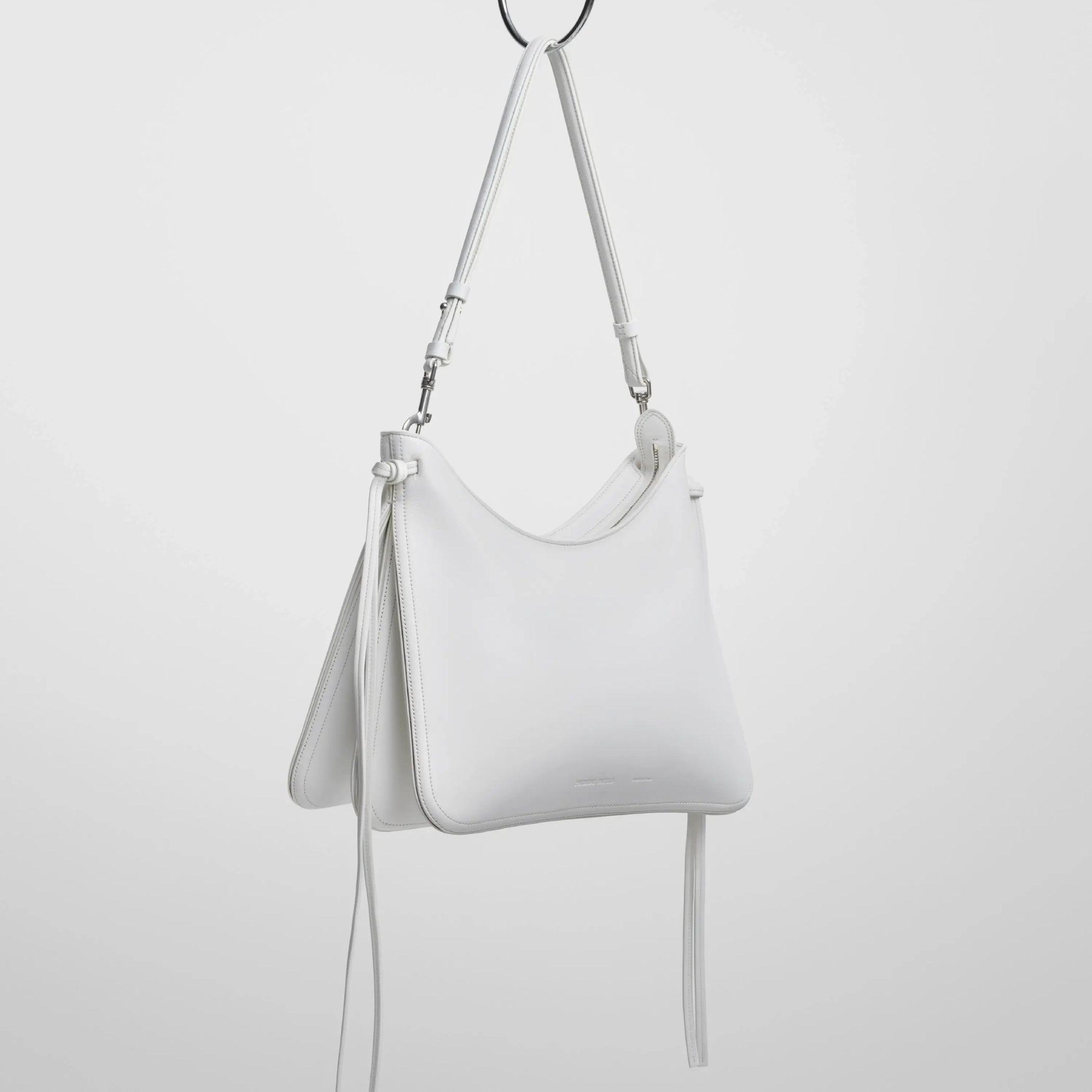 Angled view of Gig bag in white leather