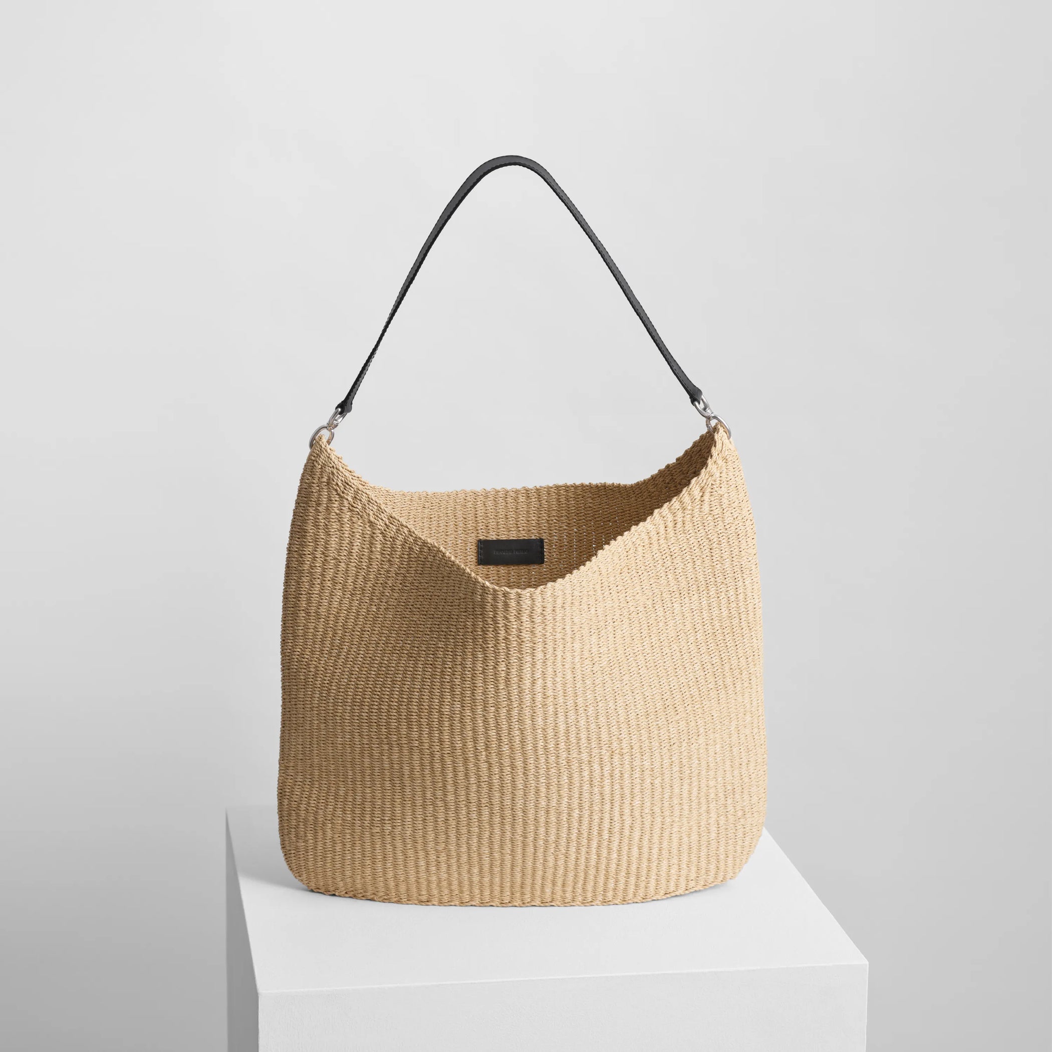 Front view of slope sling in natural woven viscose