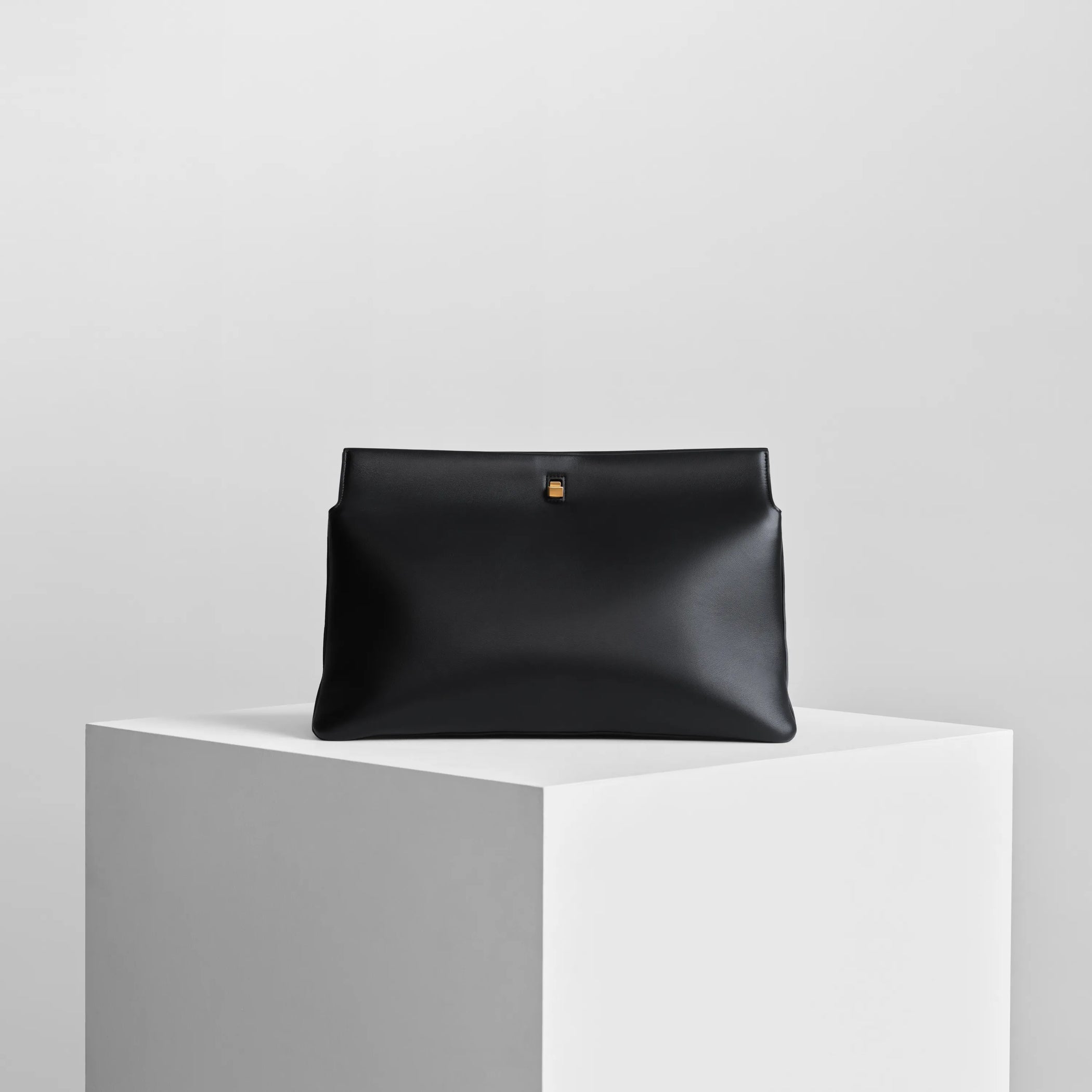 TRIPLEX CLUTCH | black leather with gold
