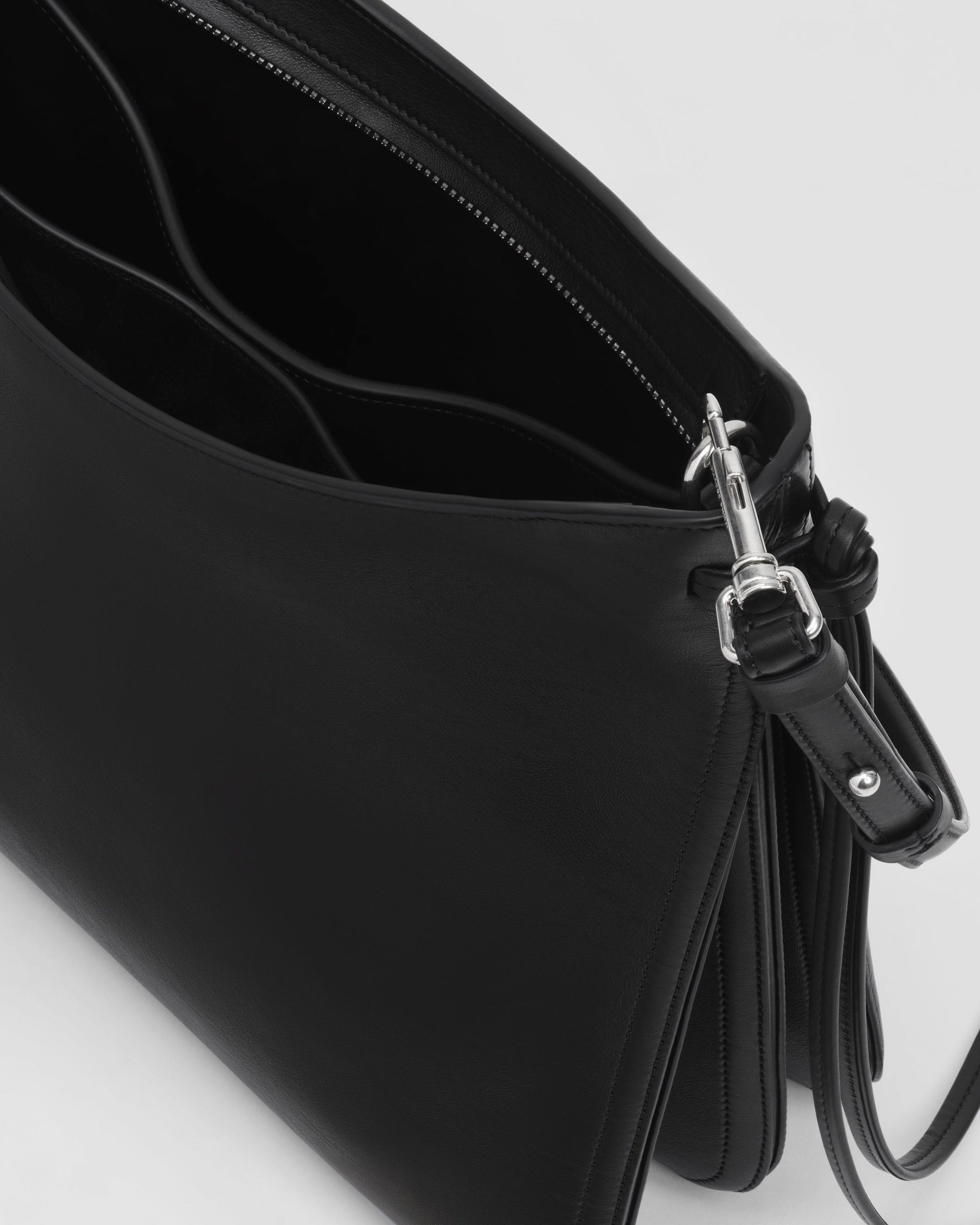 Detail view of GIG BAG in black leather
