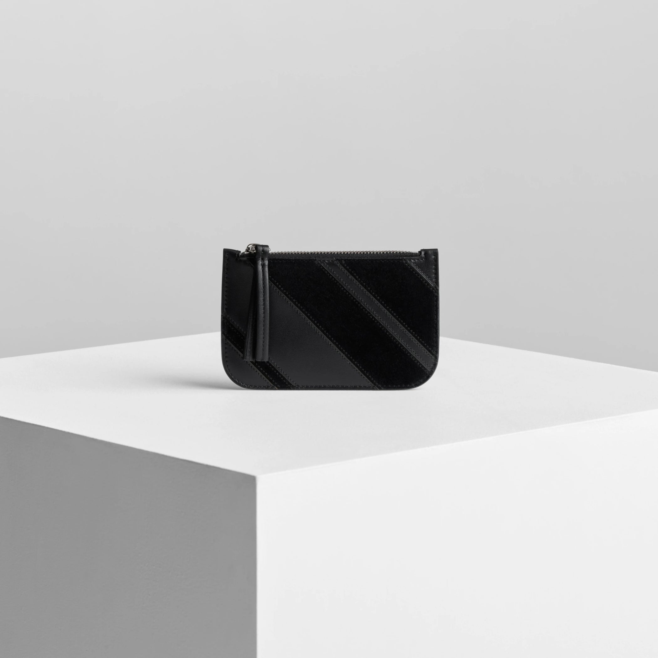 Front view of pocket card holder in black leather.