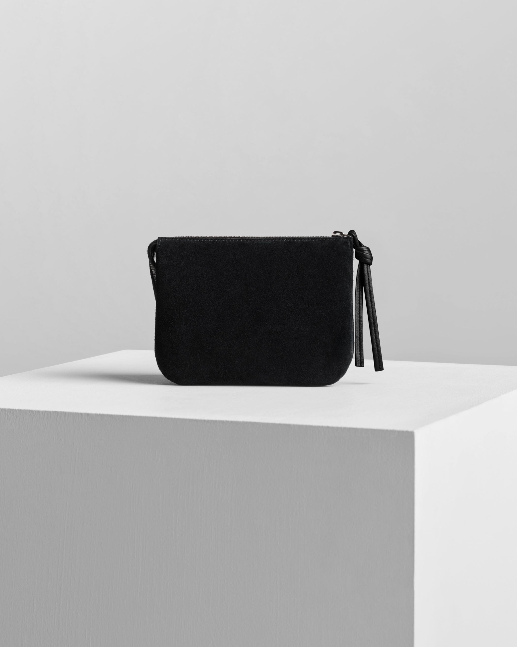 Back view of POCKET GIG in black suede leather