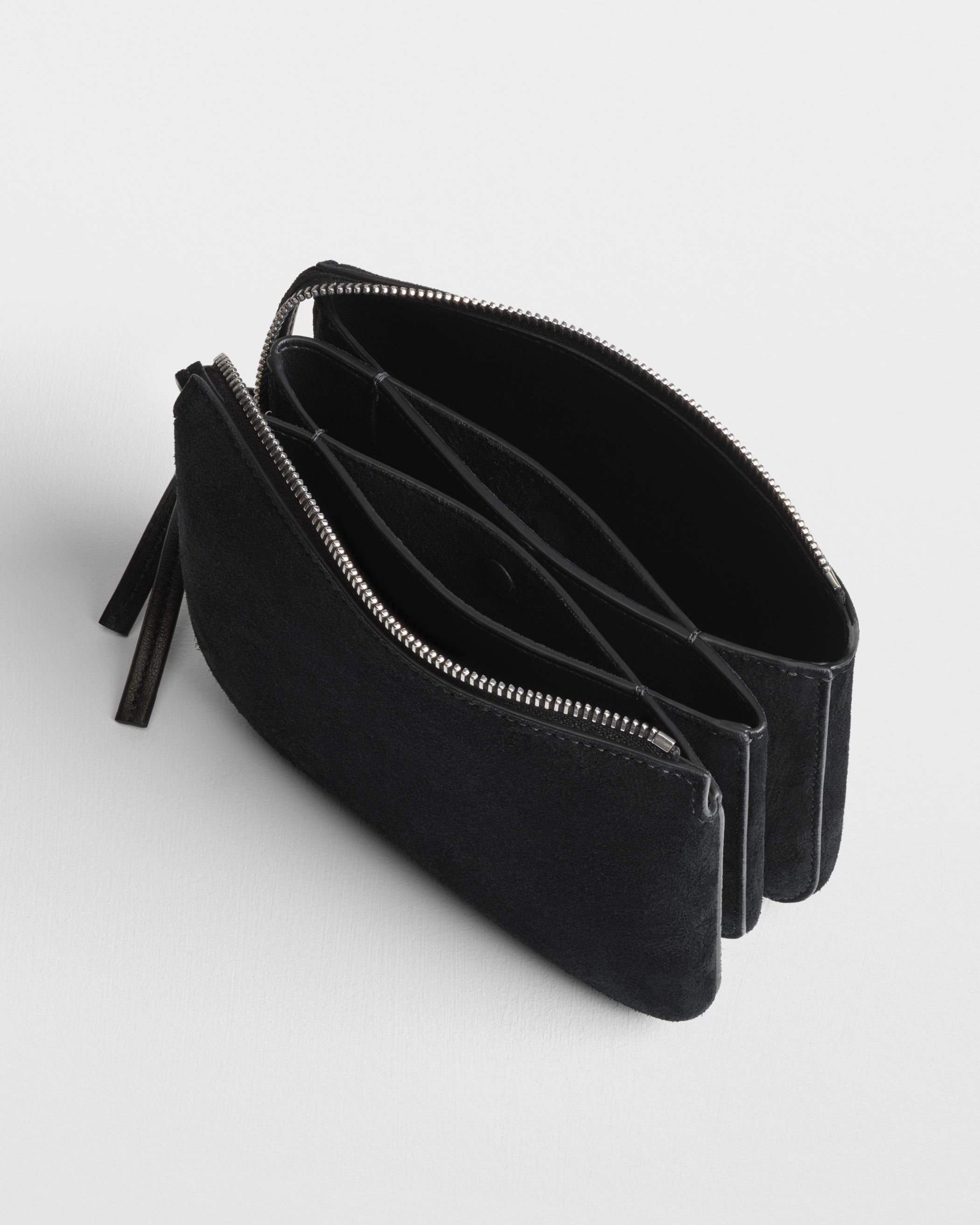 Close up detail view of POCKET GIG in black suede leather