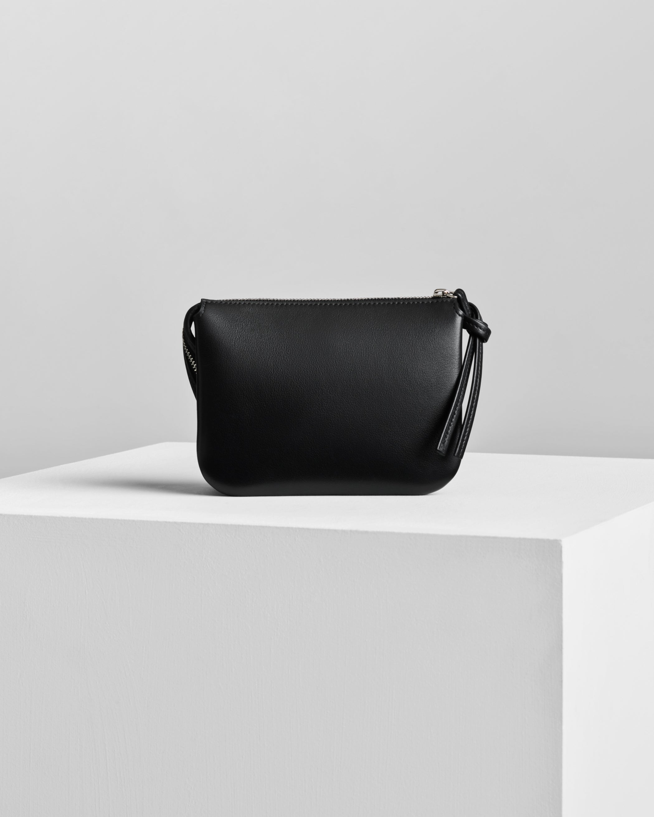 Back view of POCKET GIG in black leather