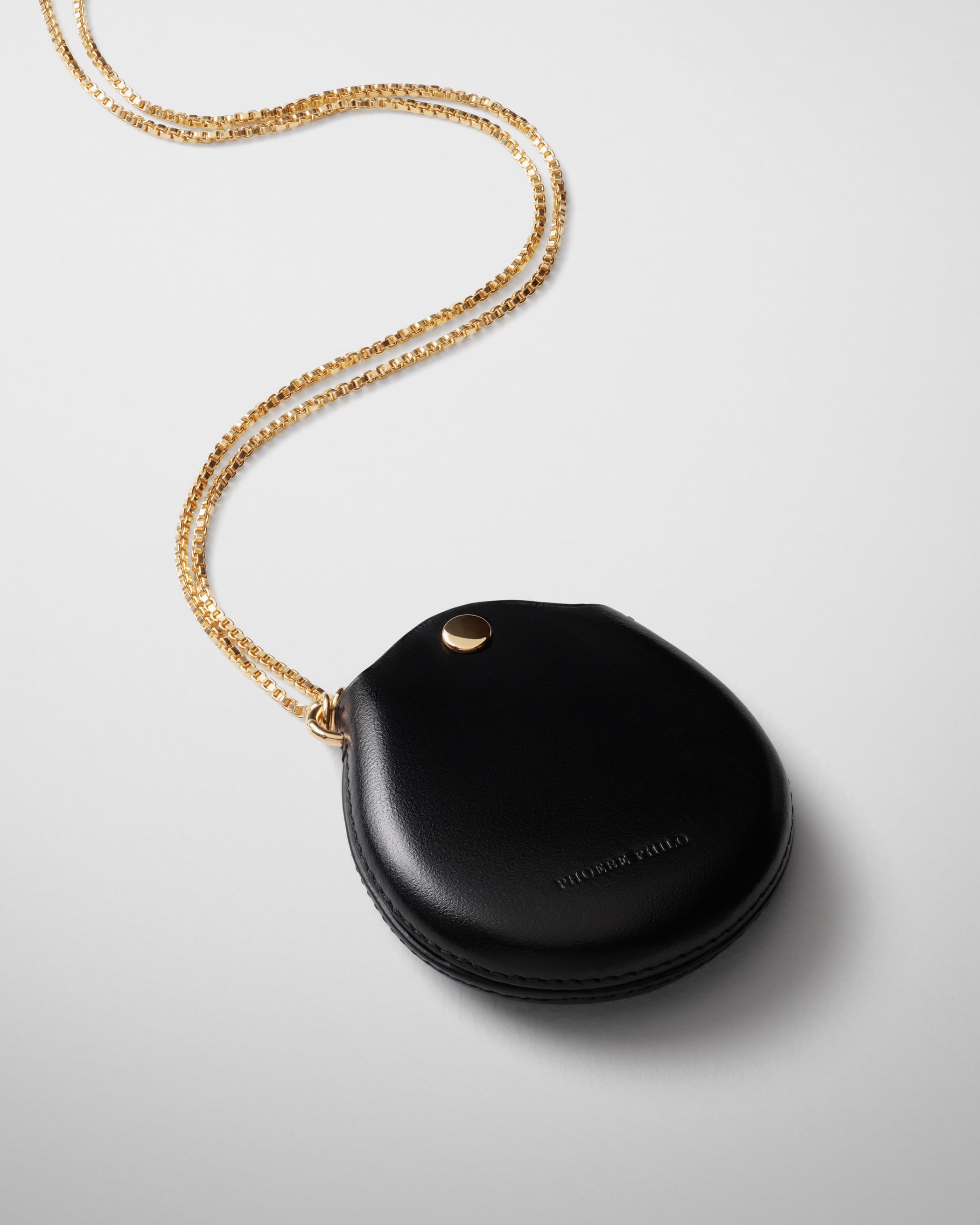 Close up detail view of Pouch Pendant in black leather