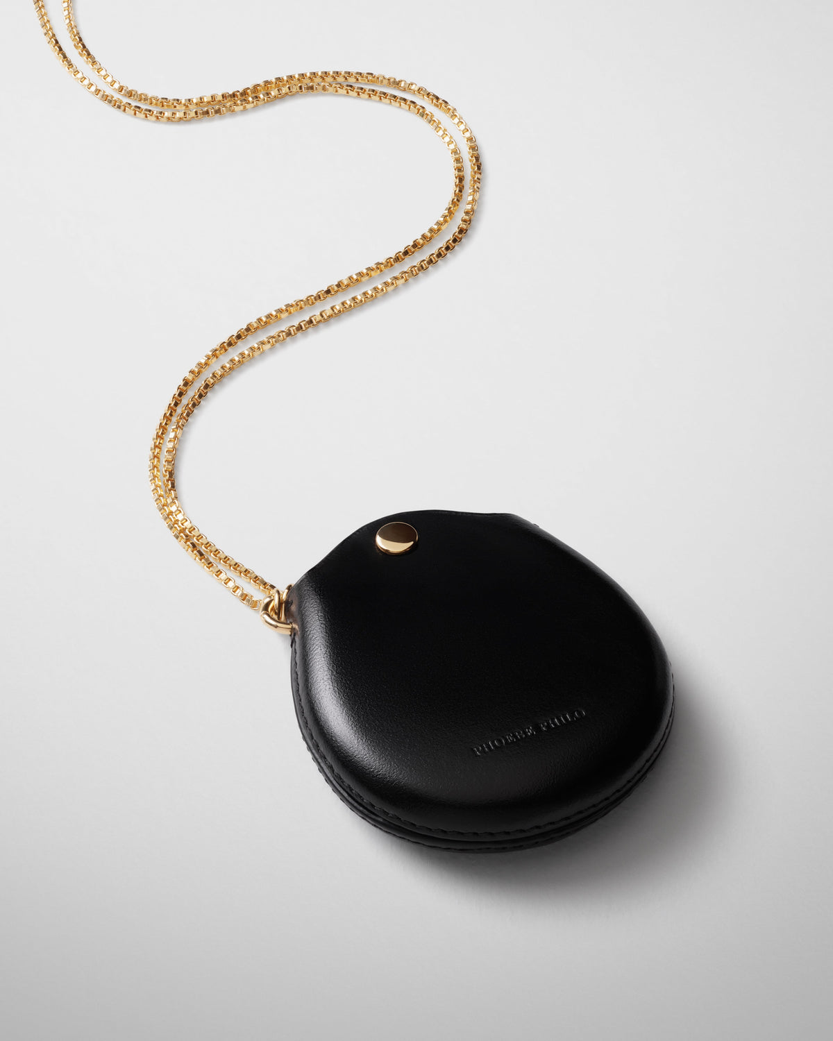 Detail view of POUCH PENDANT in black leather