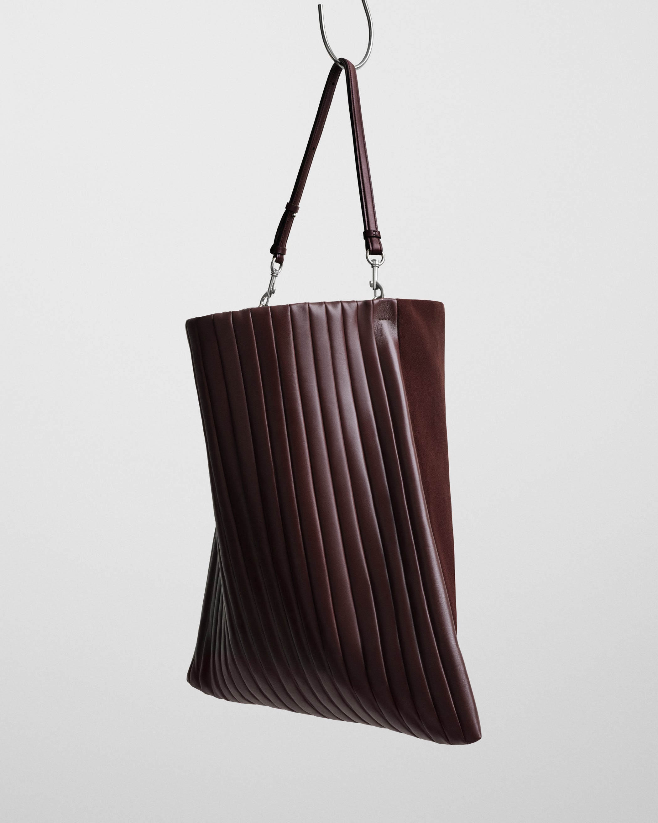Side view of ACCORDION BAG in oxblood leather
