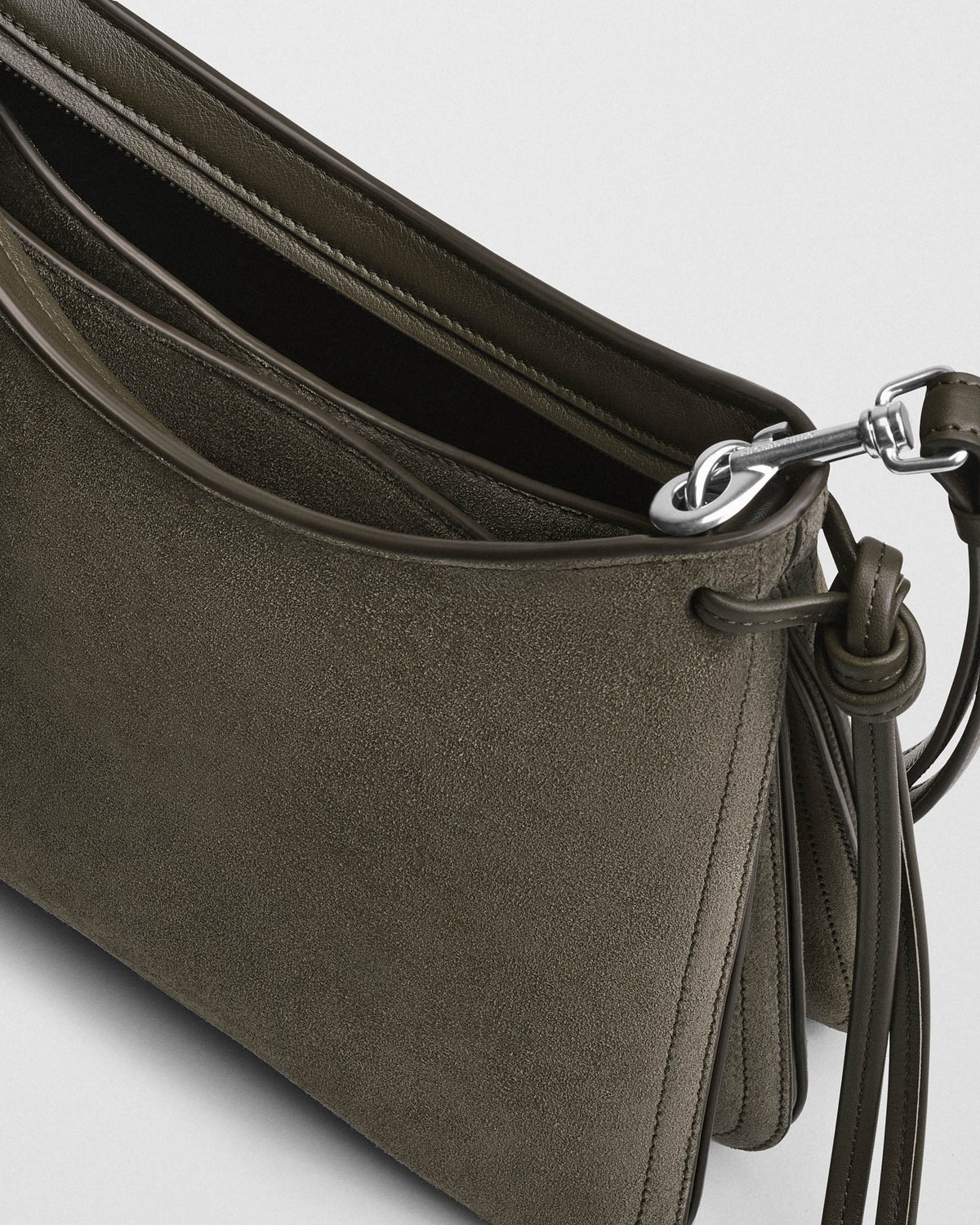 Detail view of SMALL GIG BAG in sage suede