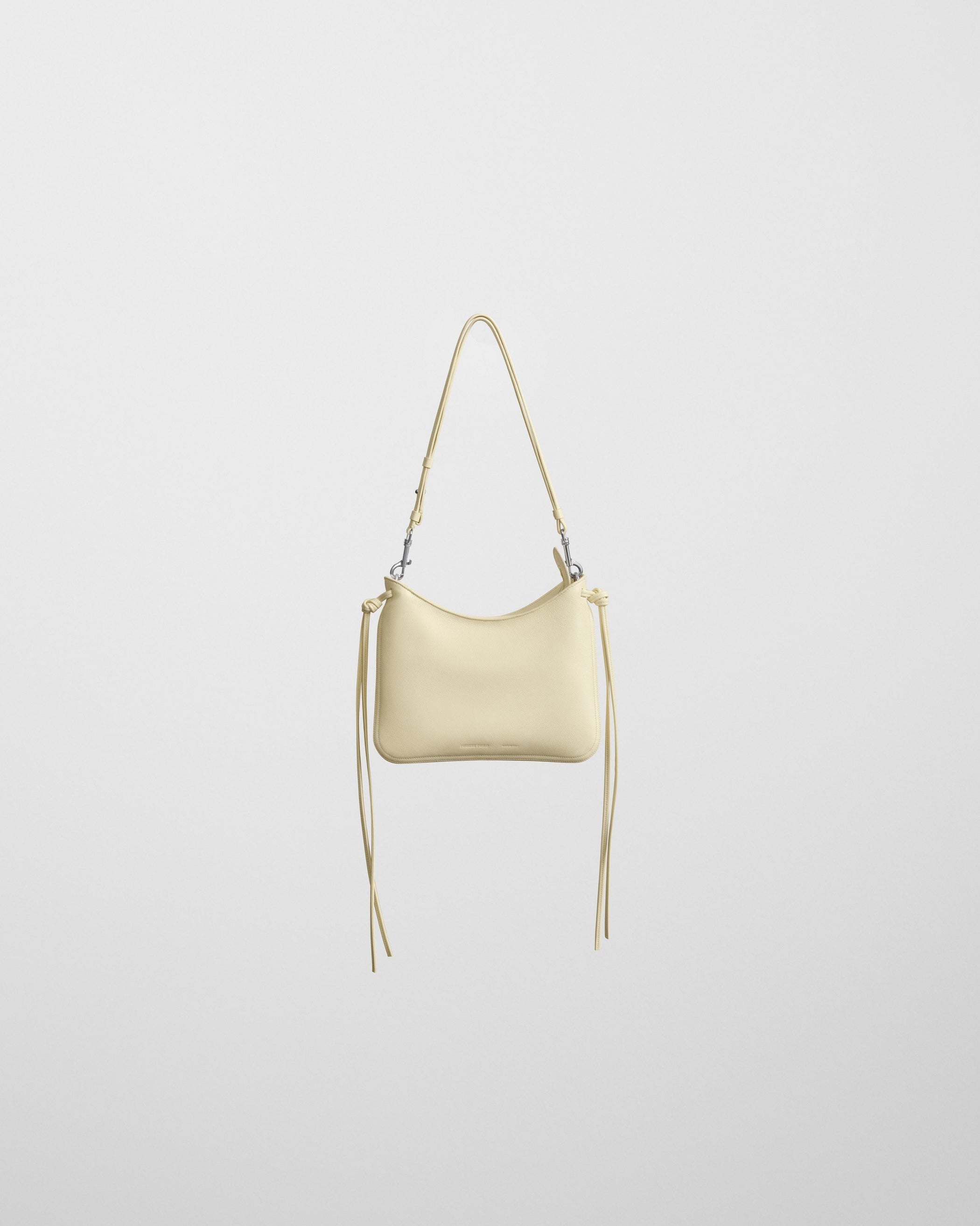 Flat front view of SMALL GIG BAG in stucco leather