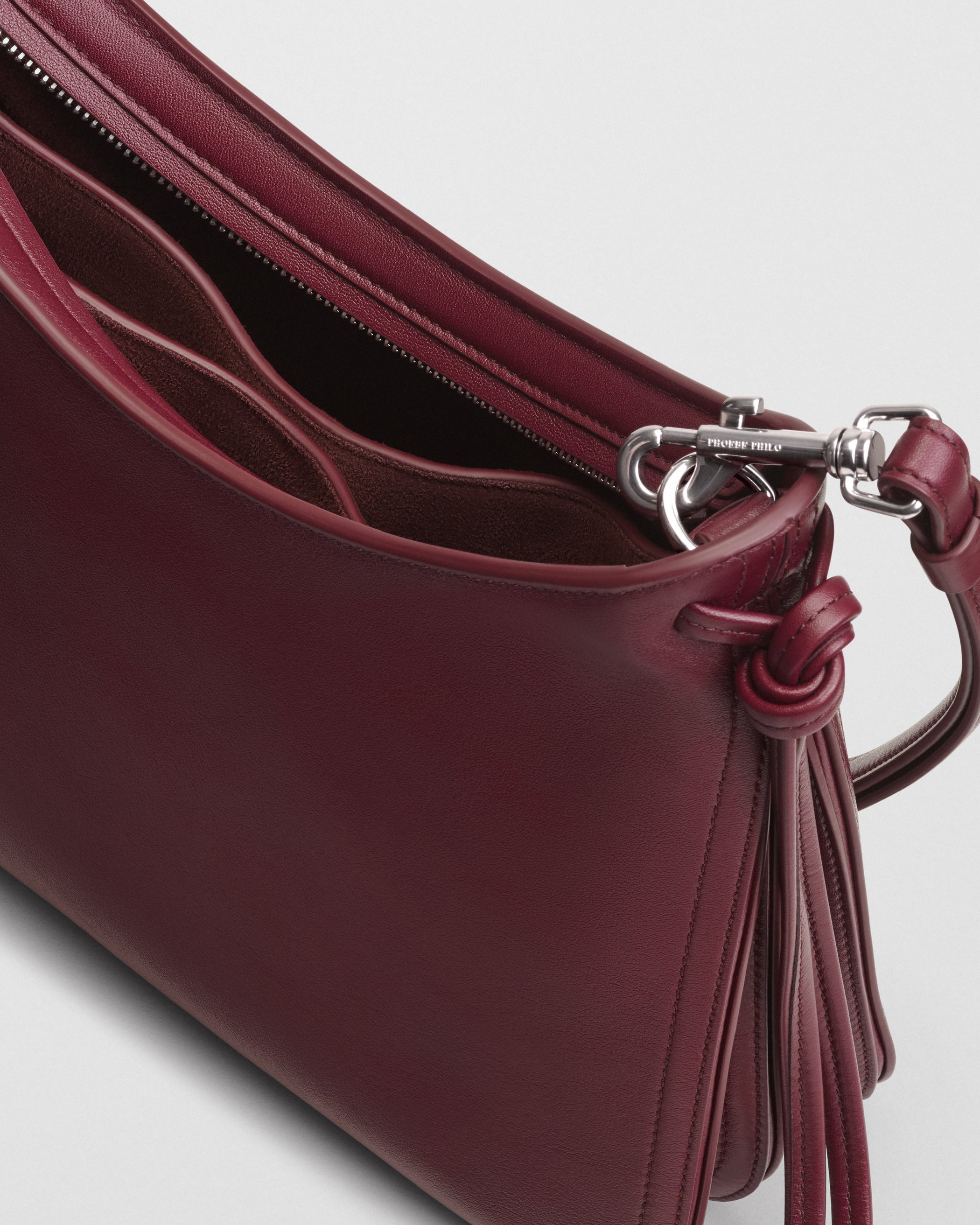 Detail view of SMALL GIG BAG in lava leather