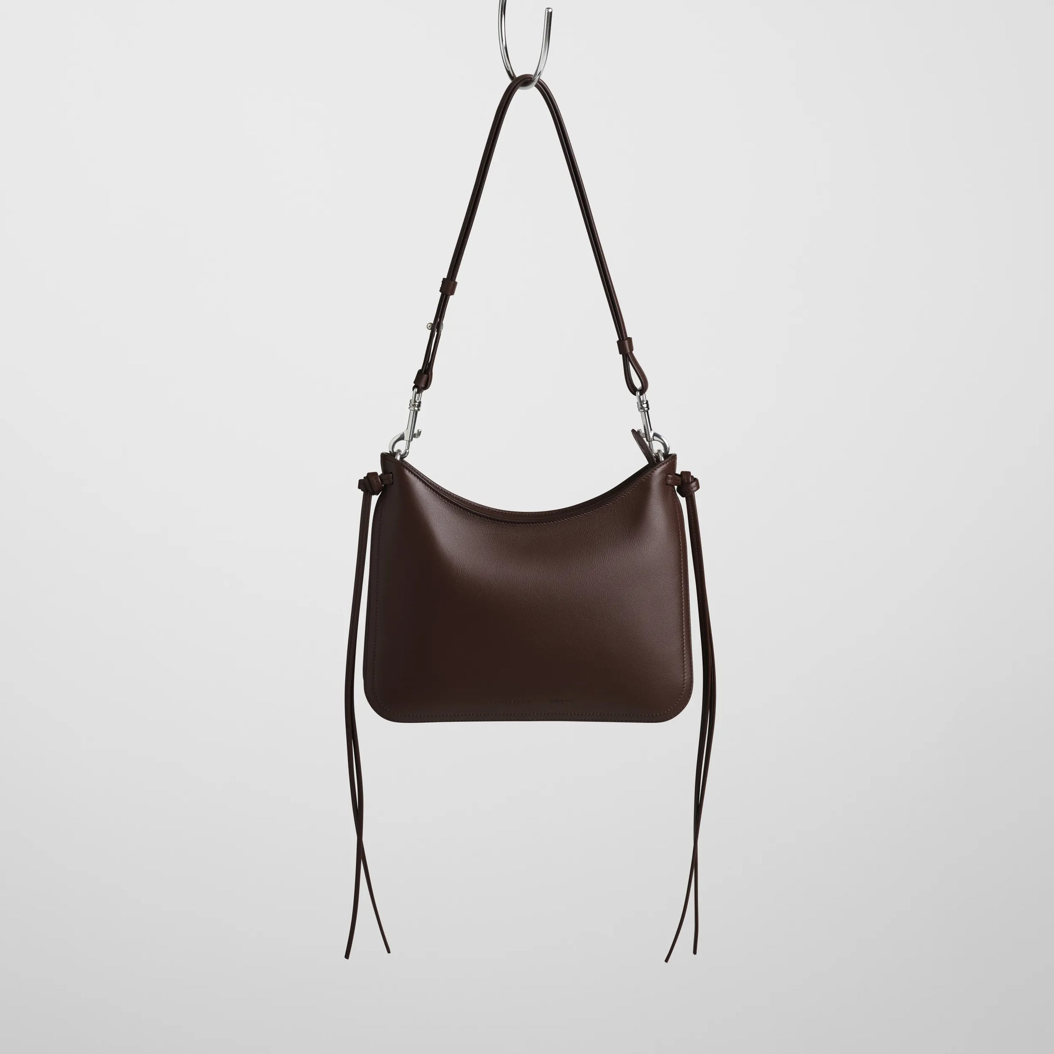Front view of small gig in cognac leather.