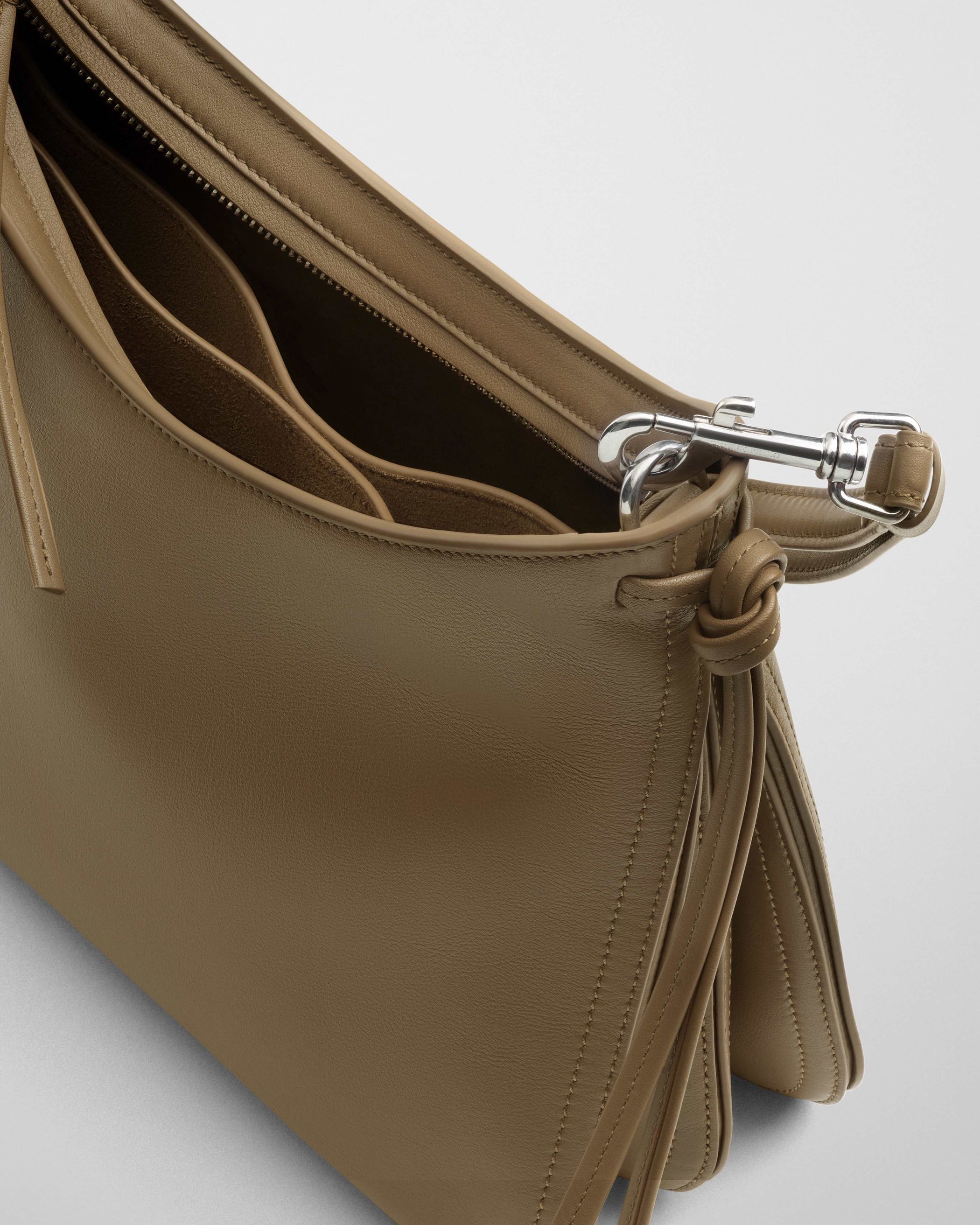 Detail view of SMALL GIG BAG in cookie leather