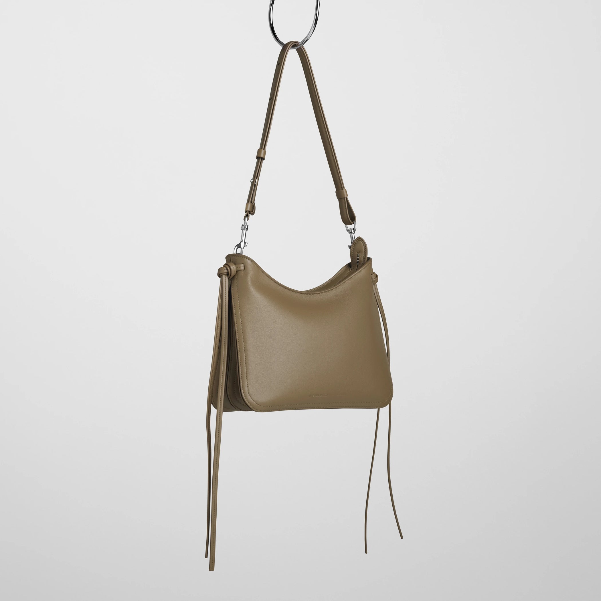 Side view of small gig bag in cookie leather.