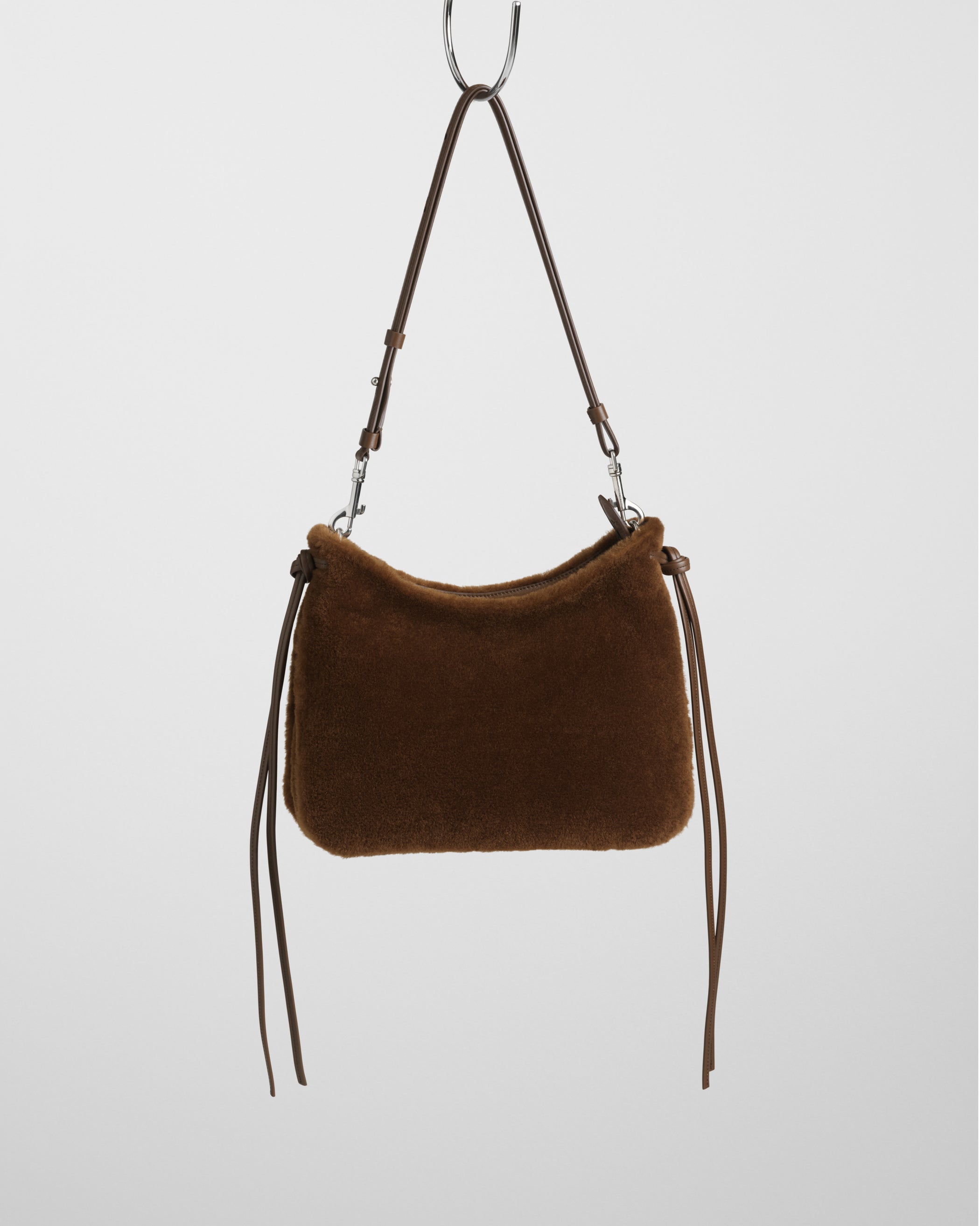 Front view of Small Gig Bag in ginger shearling