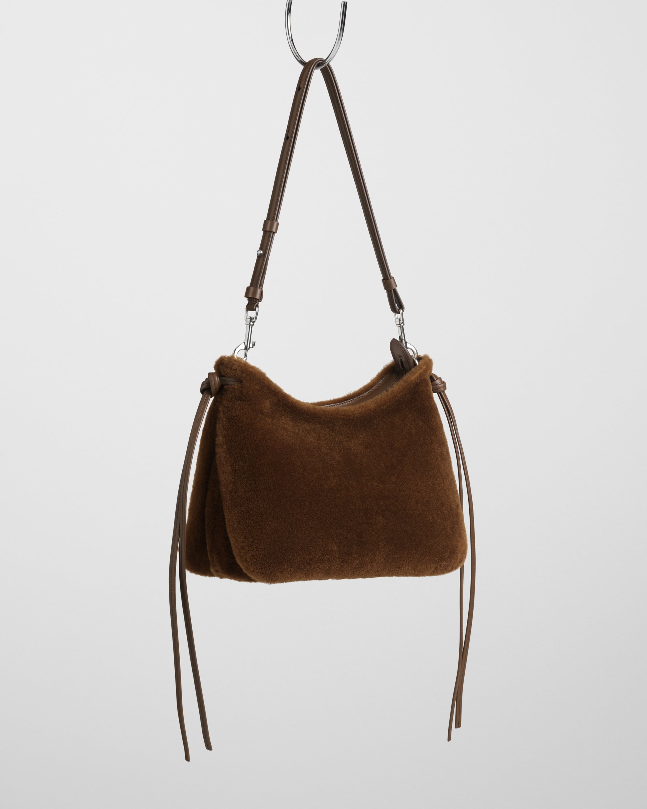 Side view of Small Gig Bag in ginger shearling