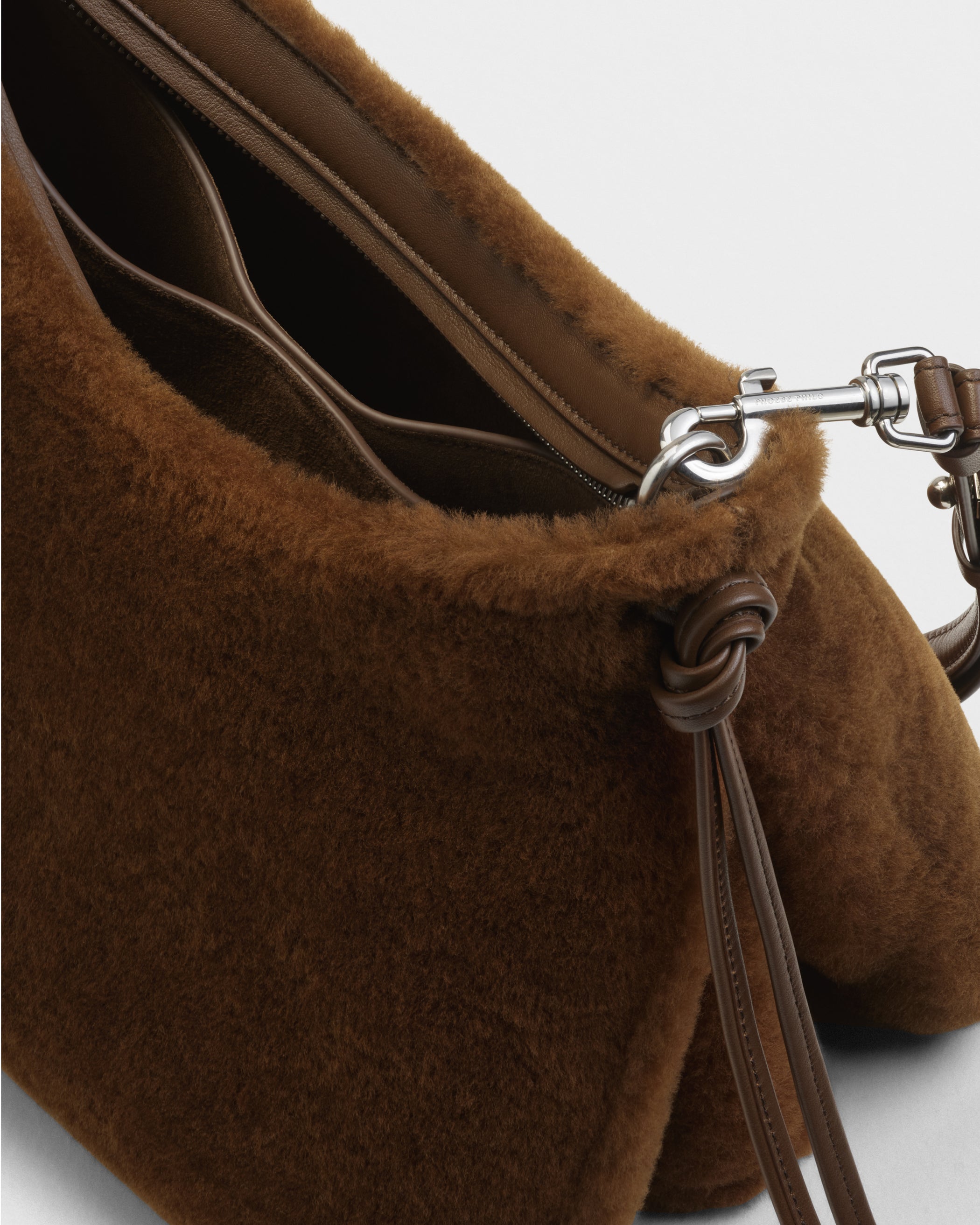 Close up detail view of Small Gig Bag in ginger shearling