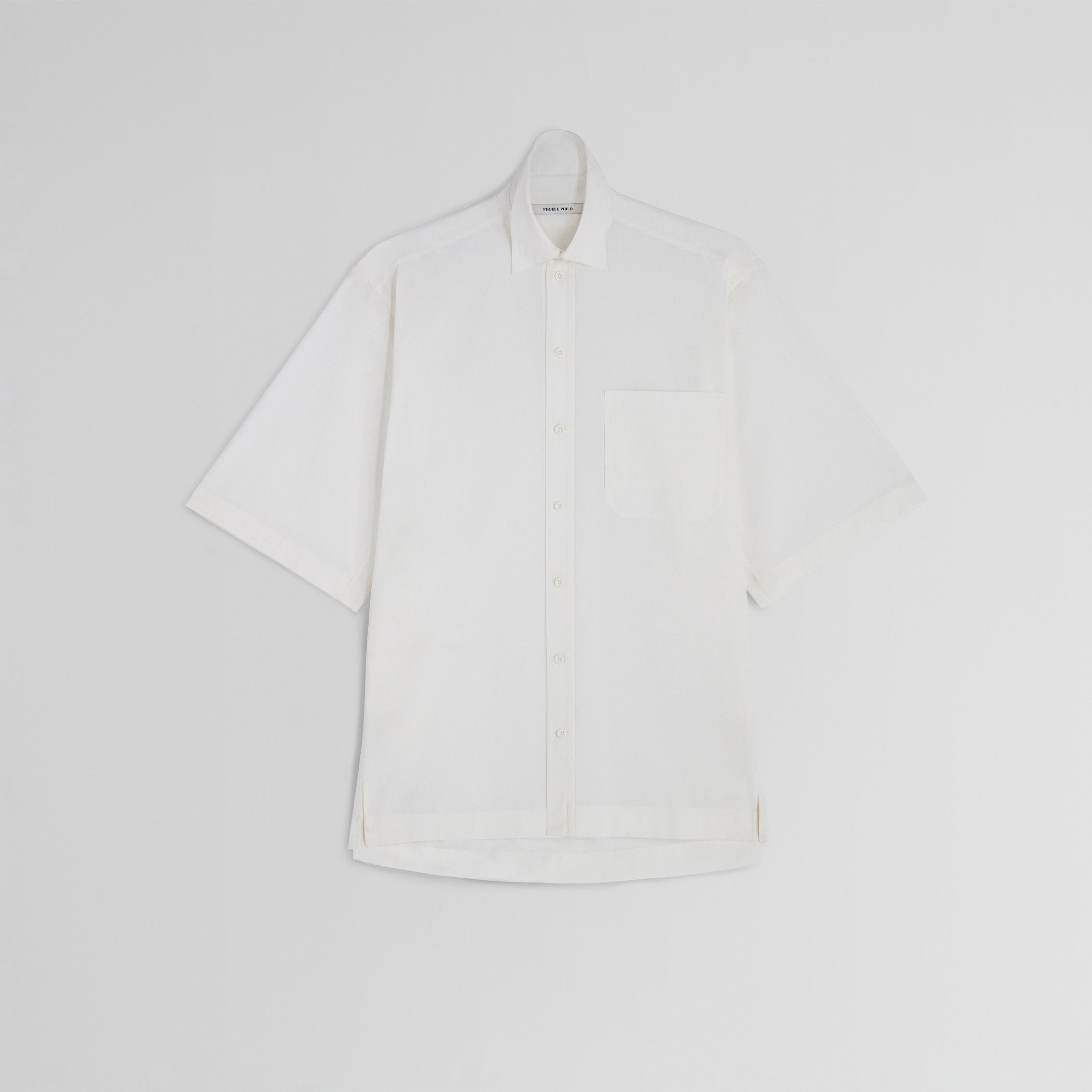 Flat front view of short sleeve shirt in vanilla cotton 