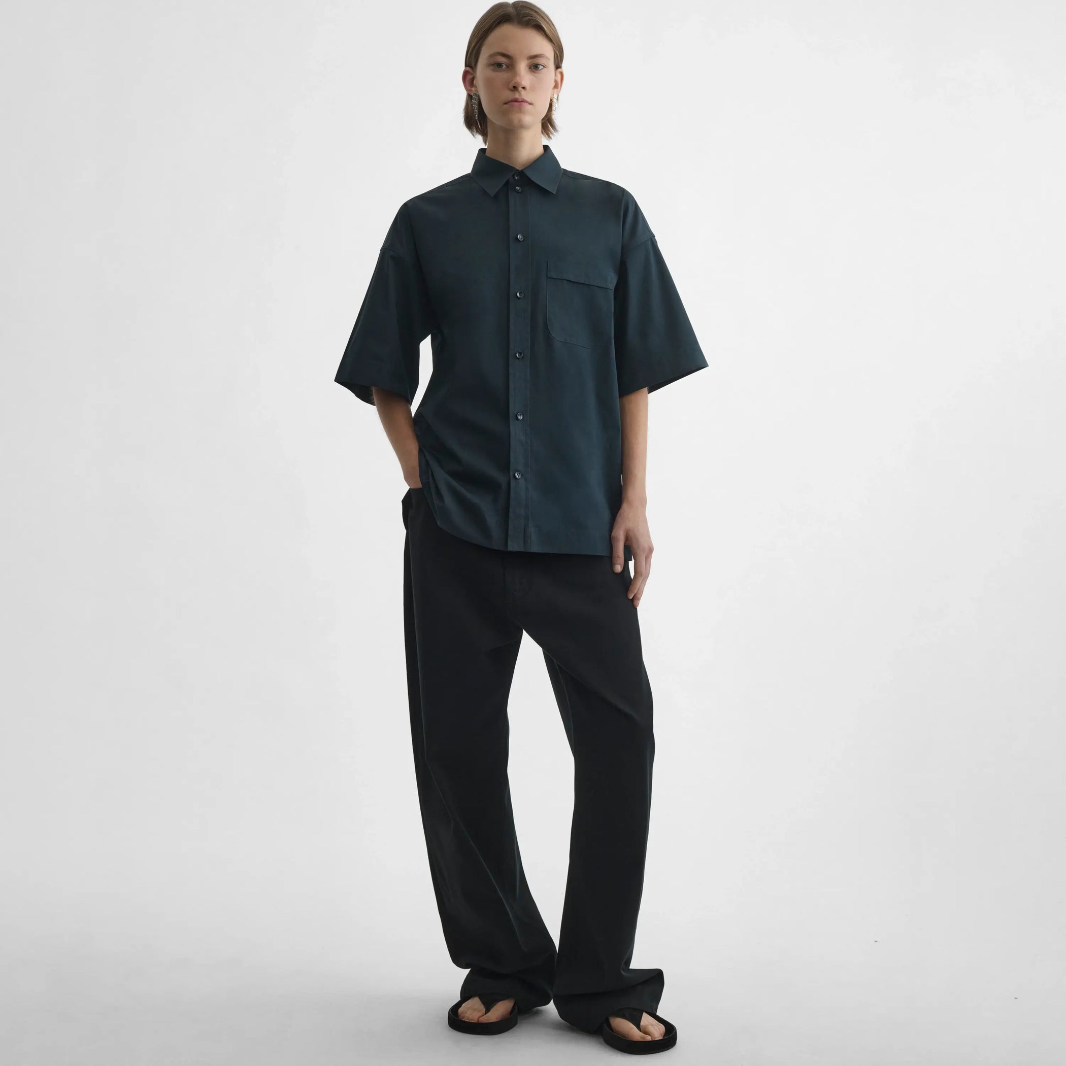 Full body front view of model wearing Short Sleeve Shirt in midnight.