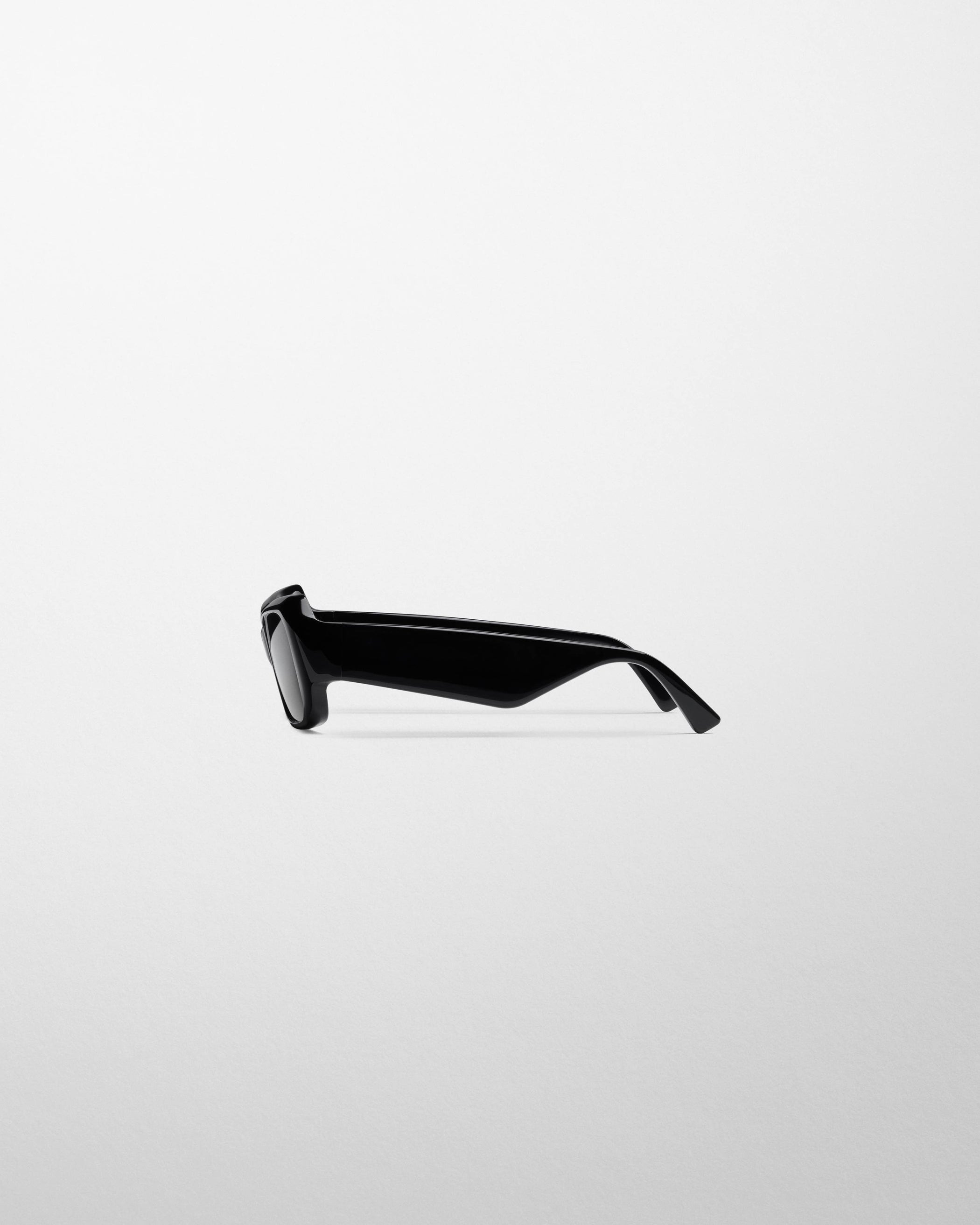 Side view of SCORE SUNGLASSES in black acetate
