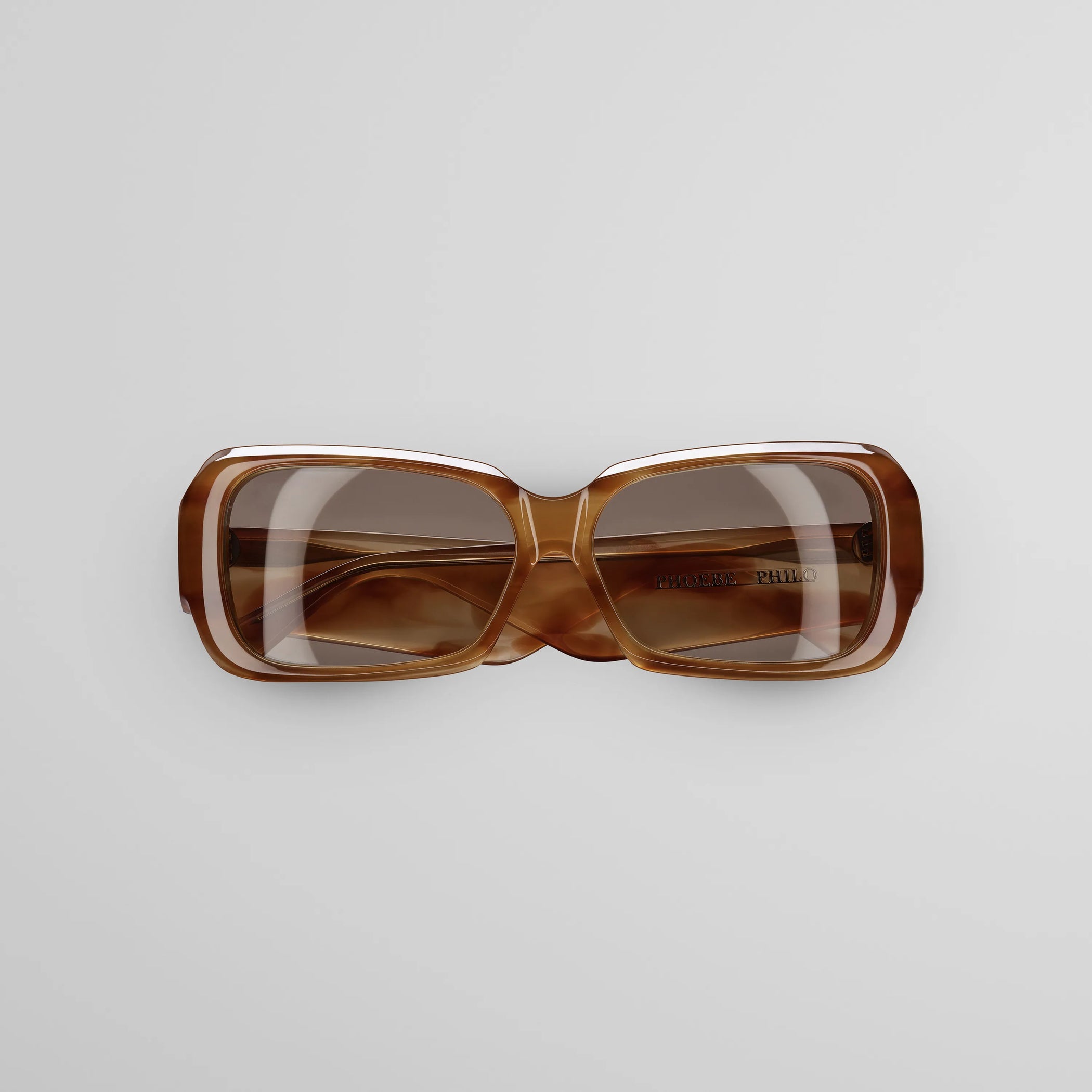 Front view of score sunglasses in tortoiseshell.