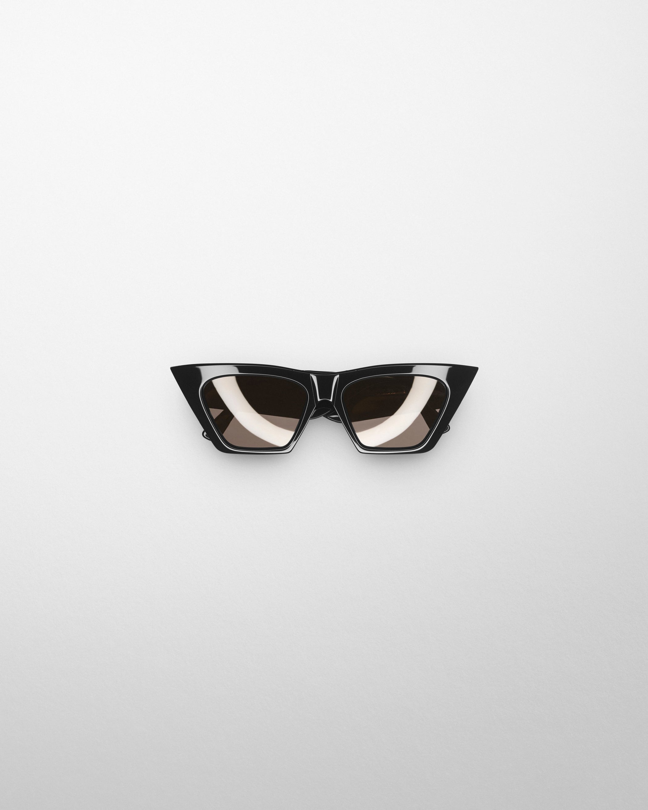 Flat front view of PEAK SUNGLASSES in black acetate