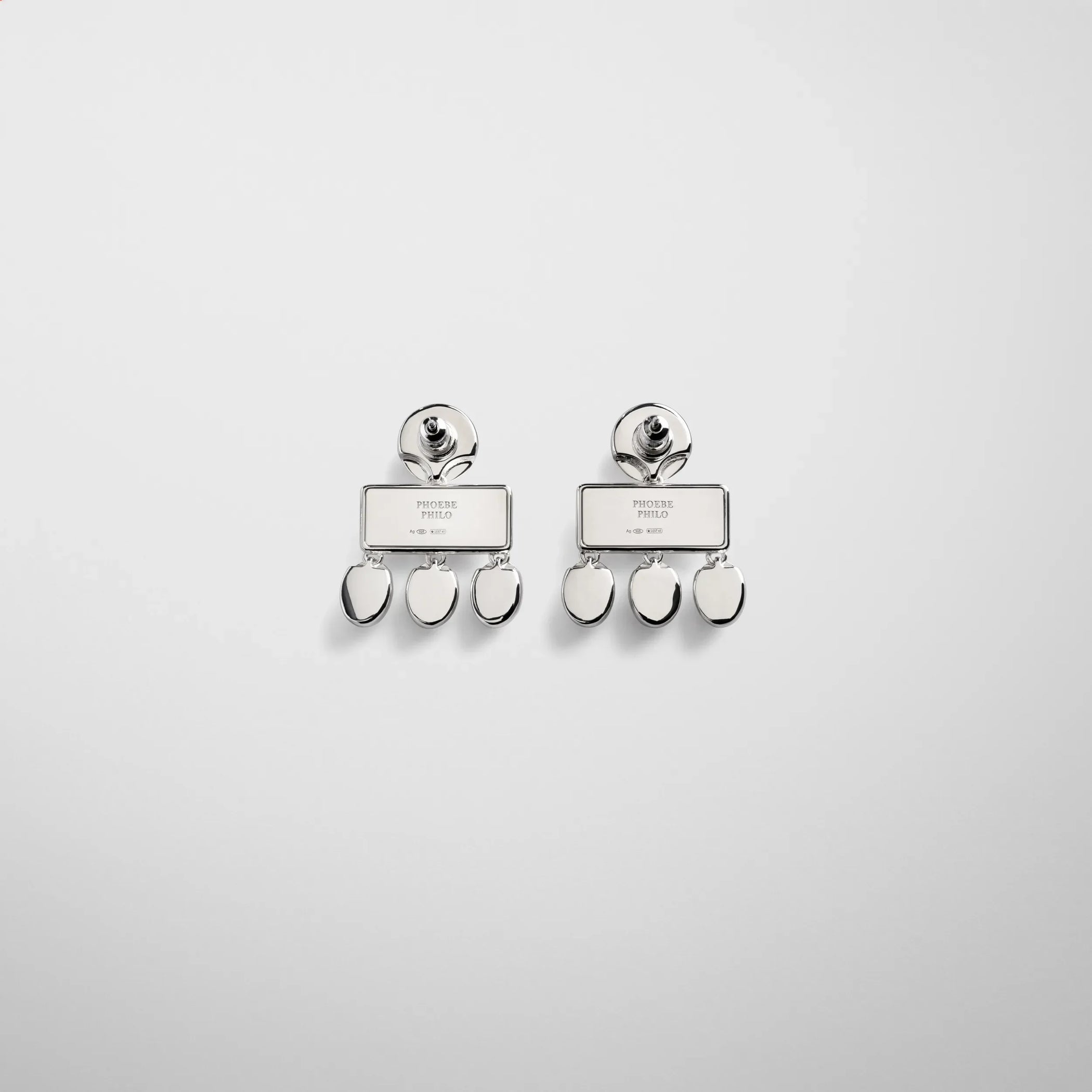 Flat back view of mini chandelier earrings in sterling silver.