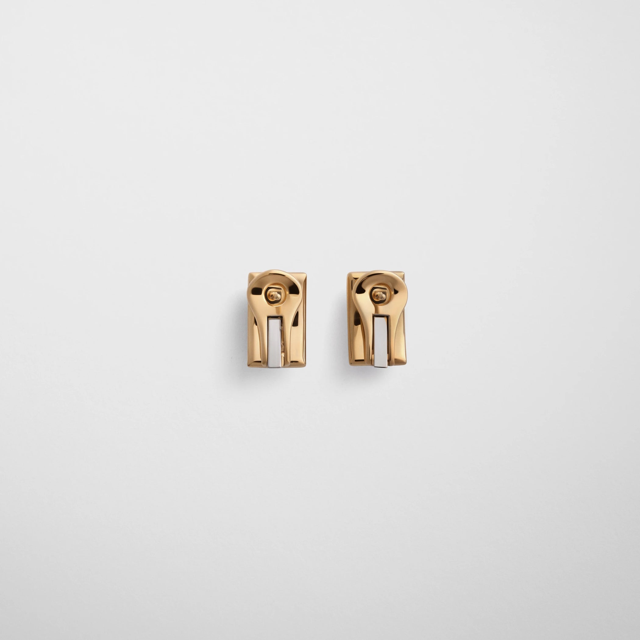 Flat back view of hallmark earrings in gold plated sterling silver.