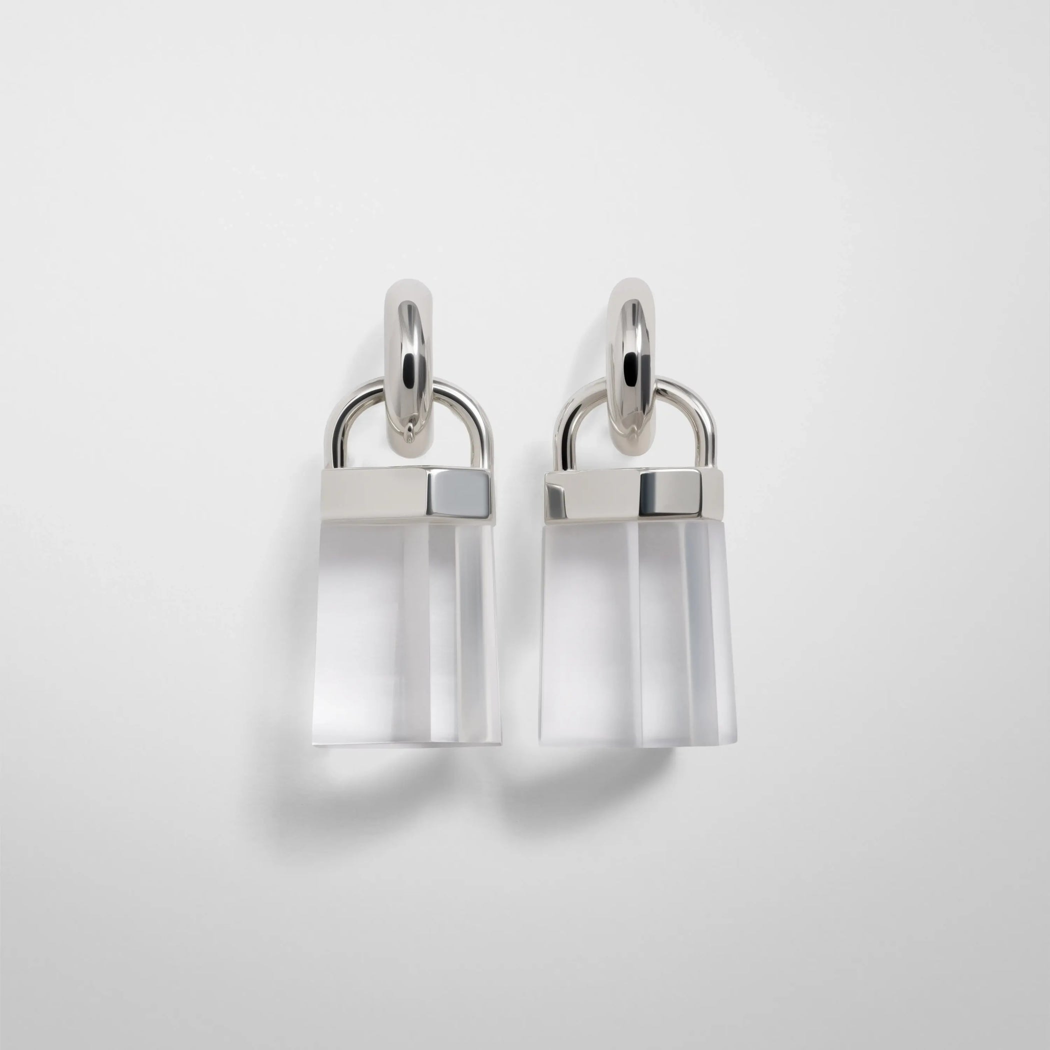 Front view of prism earrings in clear resin.