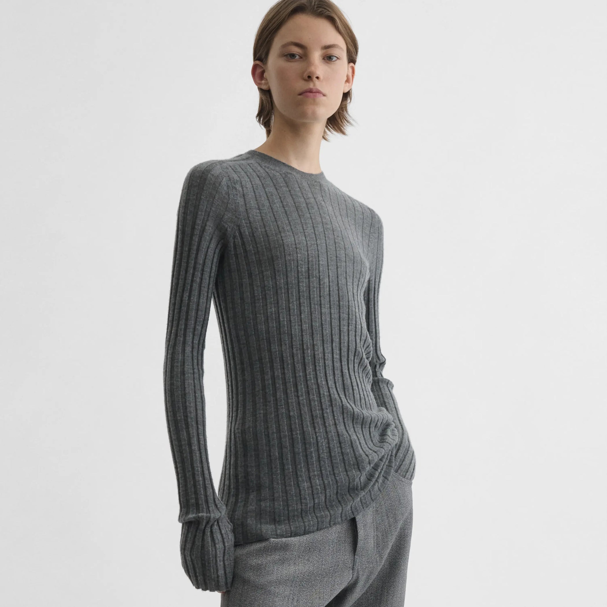 Front view of model wearing Wide Rib Crewneck in grey.