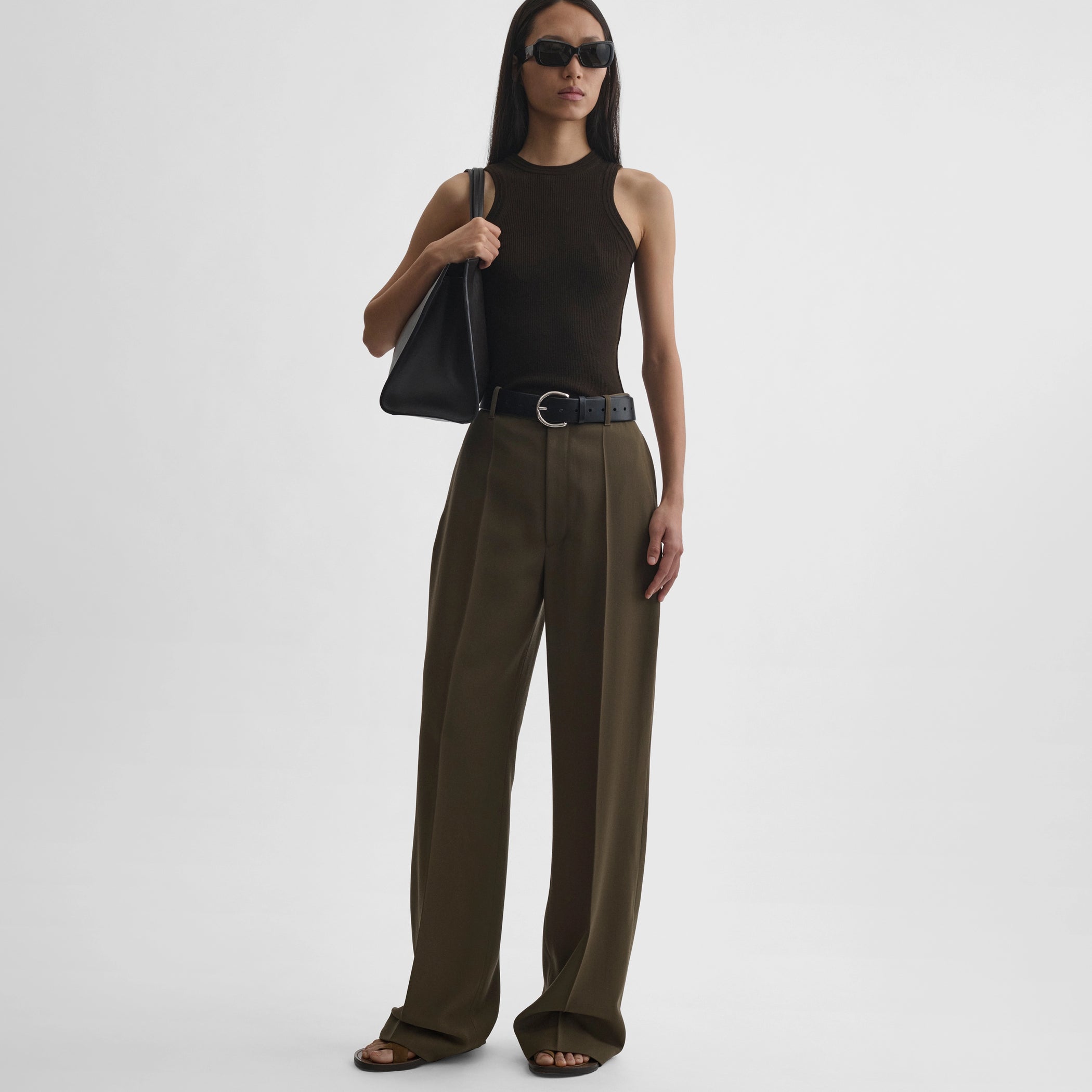 Front full body view of model wearing milanese trousers in shroom wool