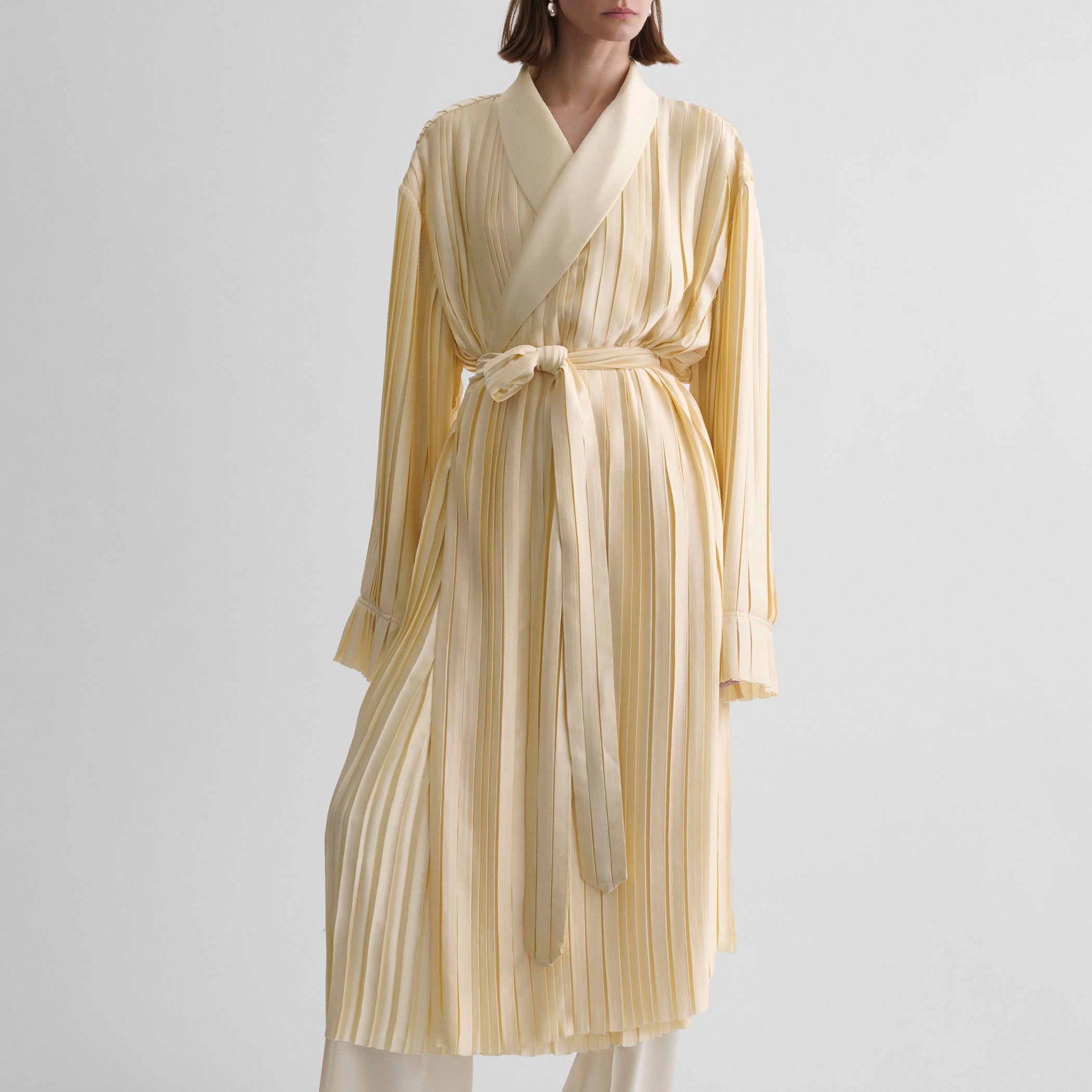 Front view of model wearing PLEATED ROBE in vanilla satin