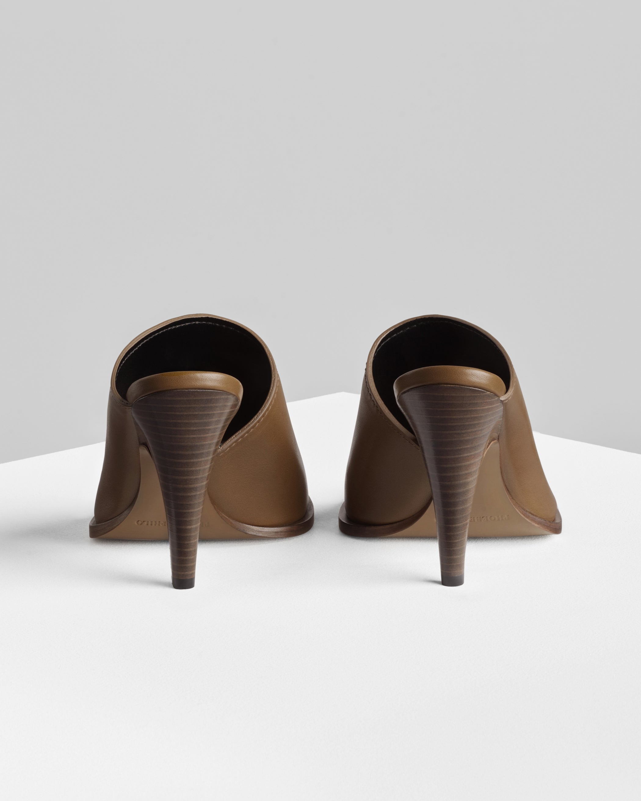 Back view of BOLO MULE 105 in caramel leather