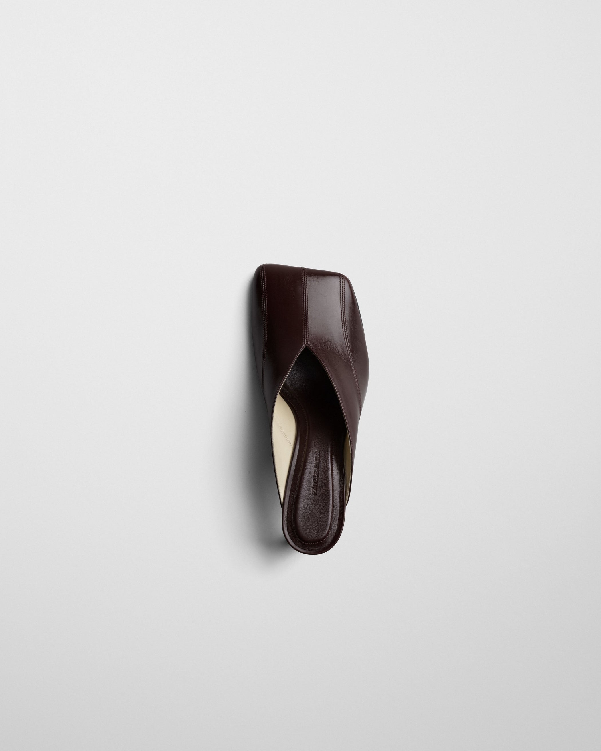 View of TILT MULE in oxblood leather