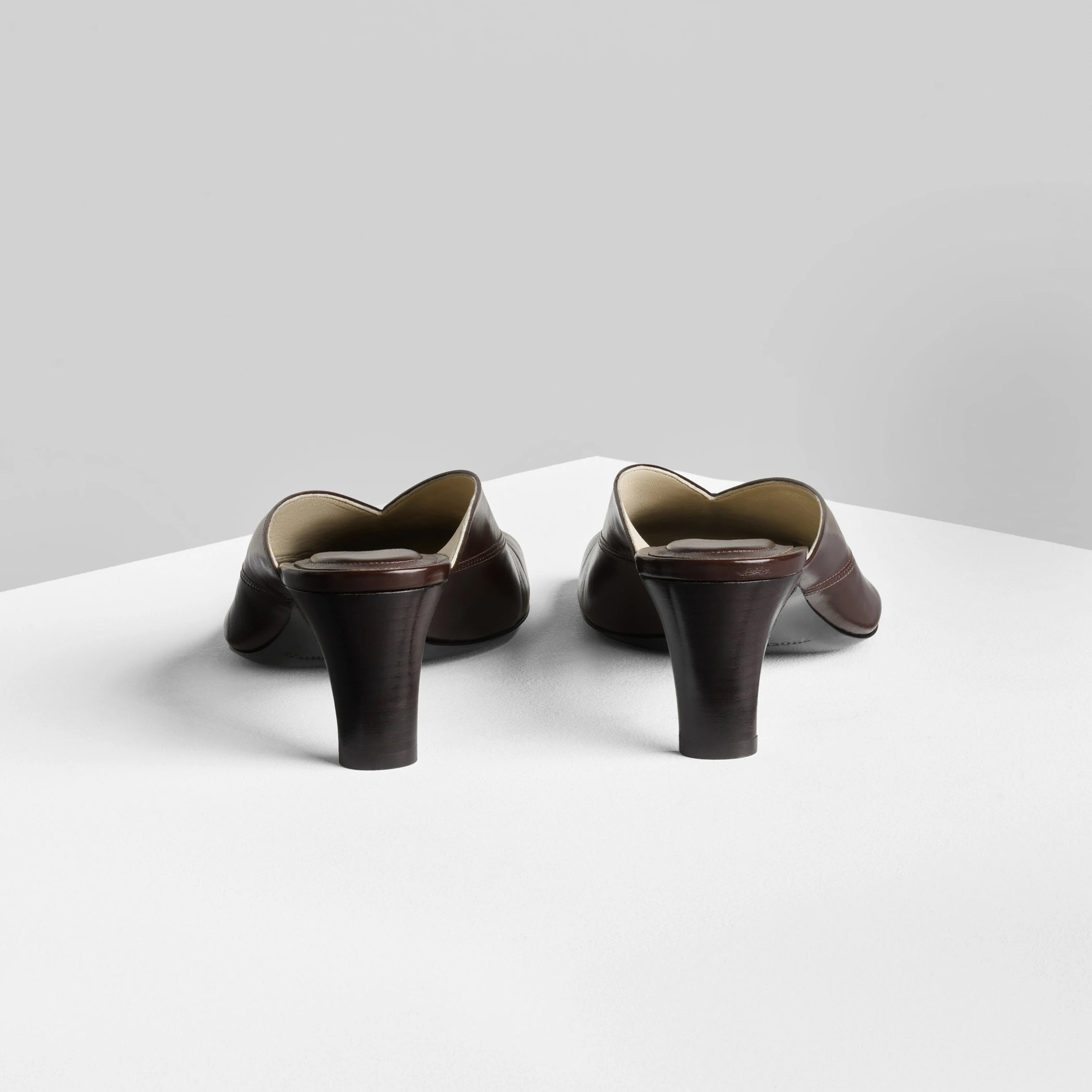 Back view of tilt mule in oxblood leather.