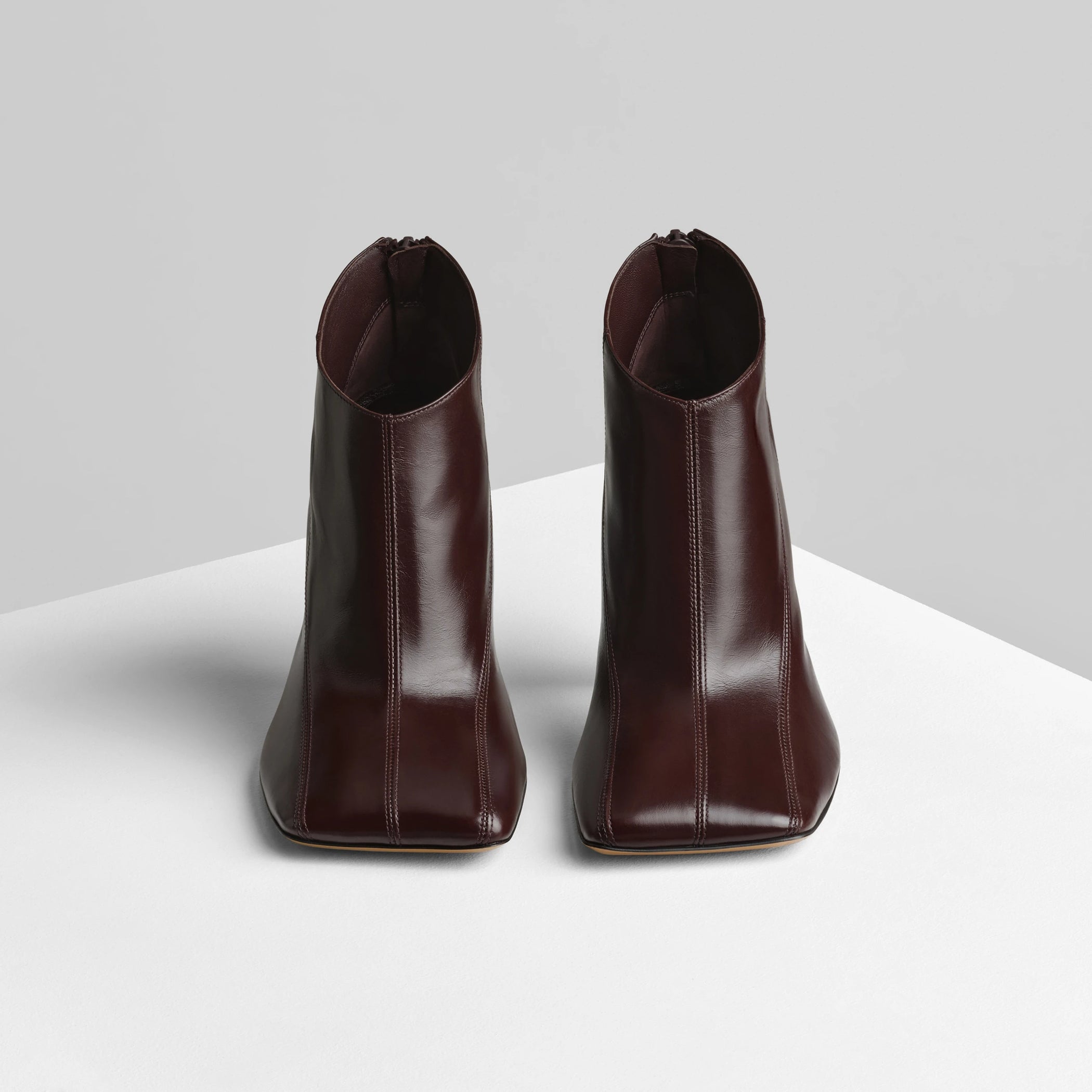 Front view of tilt ankle boot in oxblood leather.