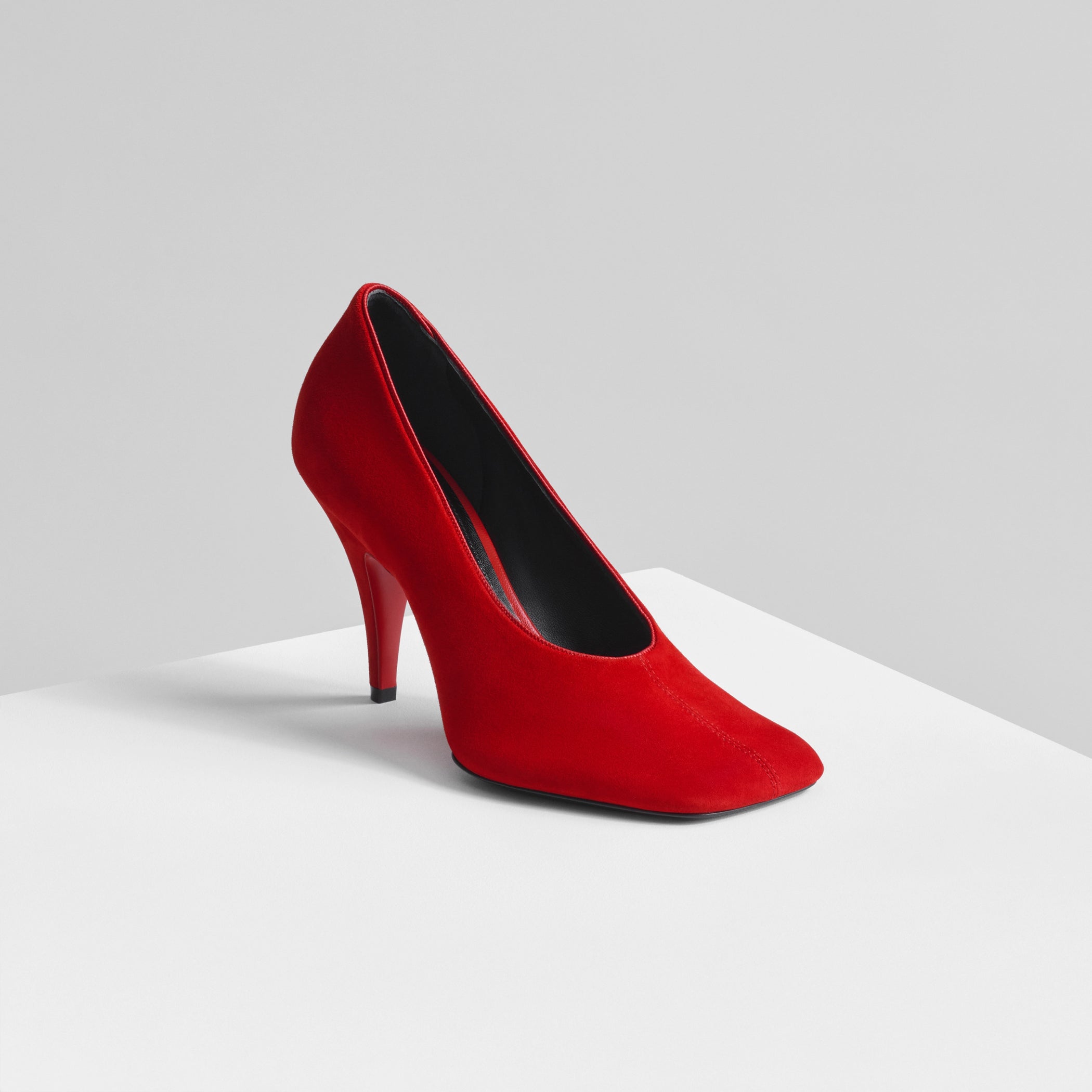 Angled front view of soft pump 90 in fluoro red leather 