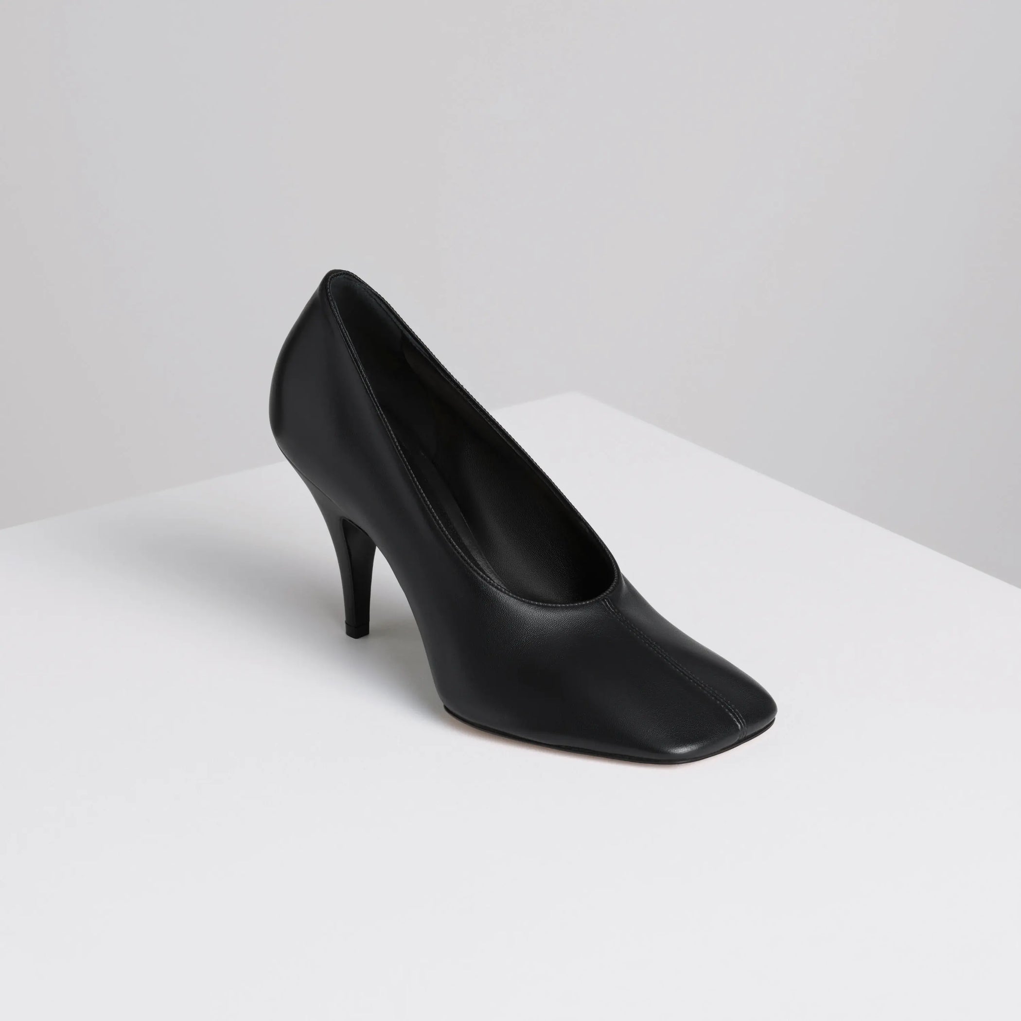 Angled view of soft pump 90 in nappa black 