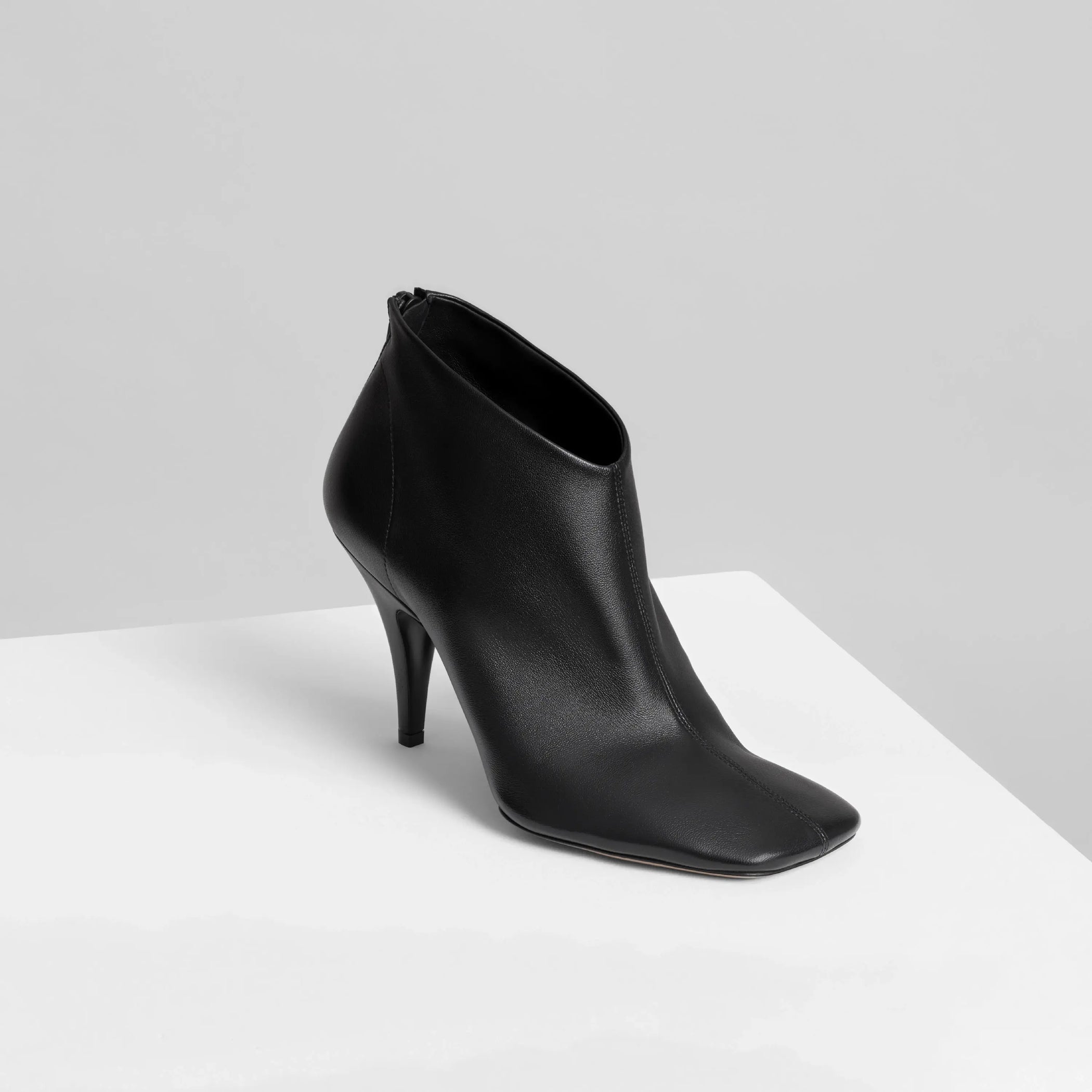 Angled view of ankle boot 90 in nappa black 
