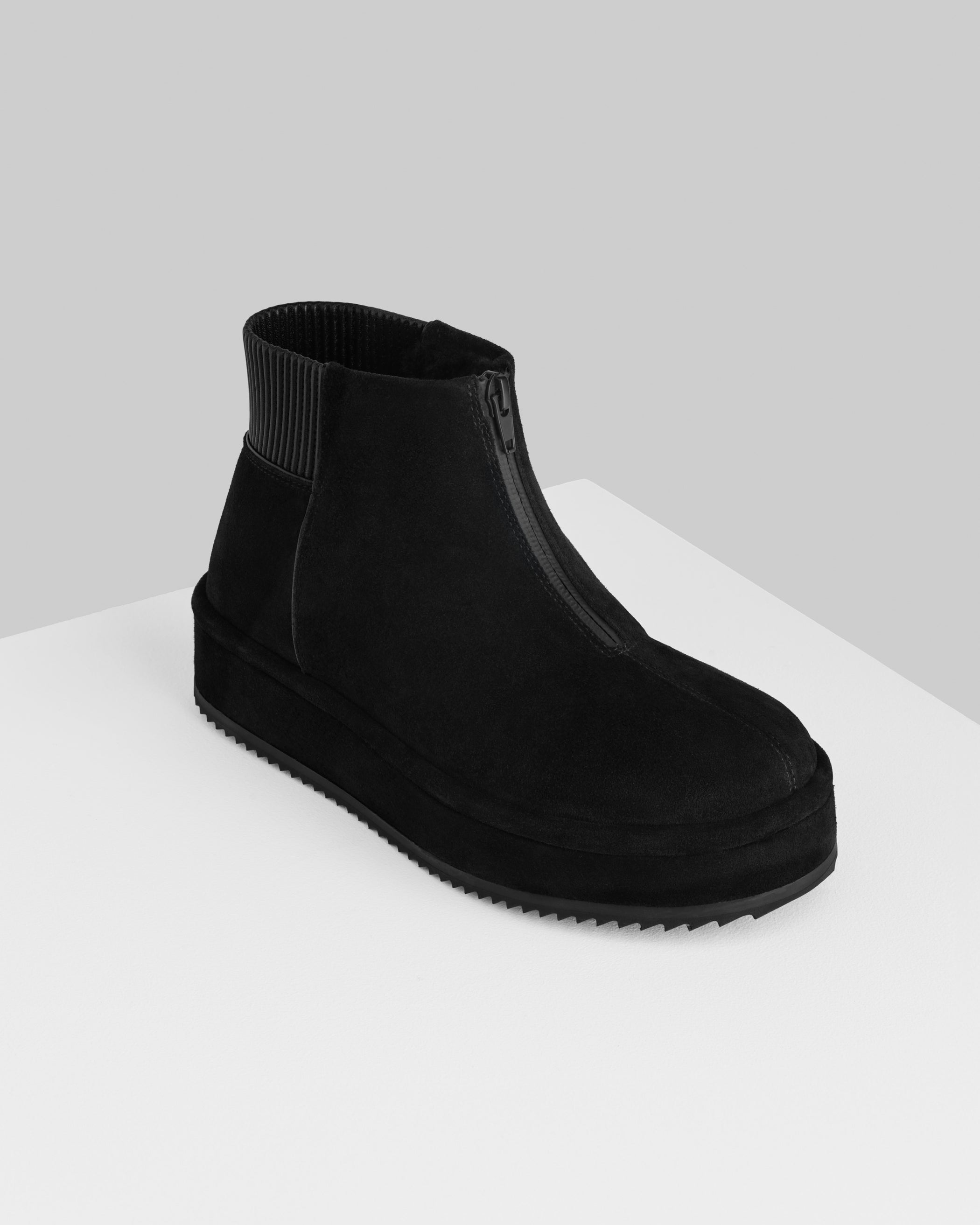 Side view of Bumper Bootie in black leather
