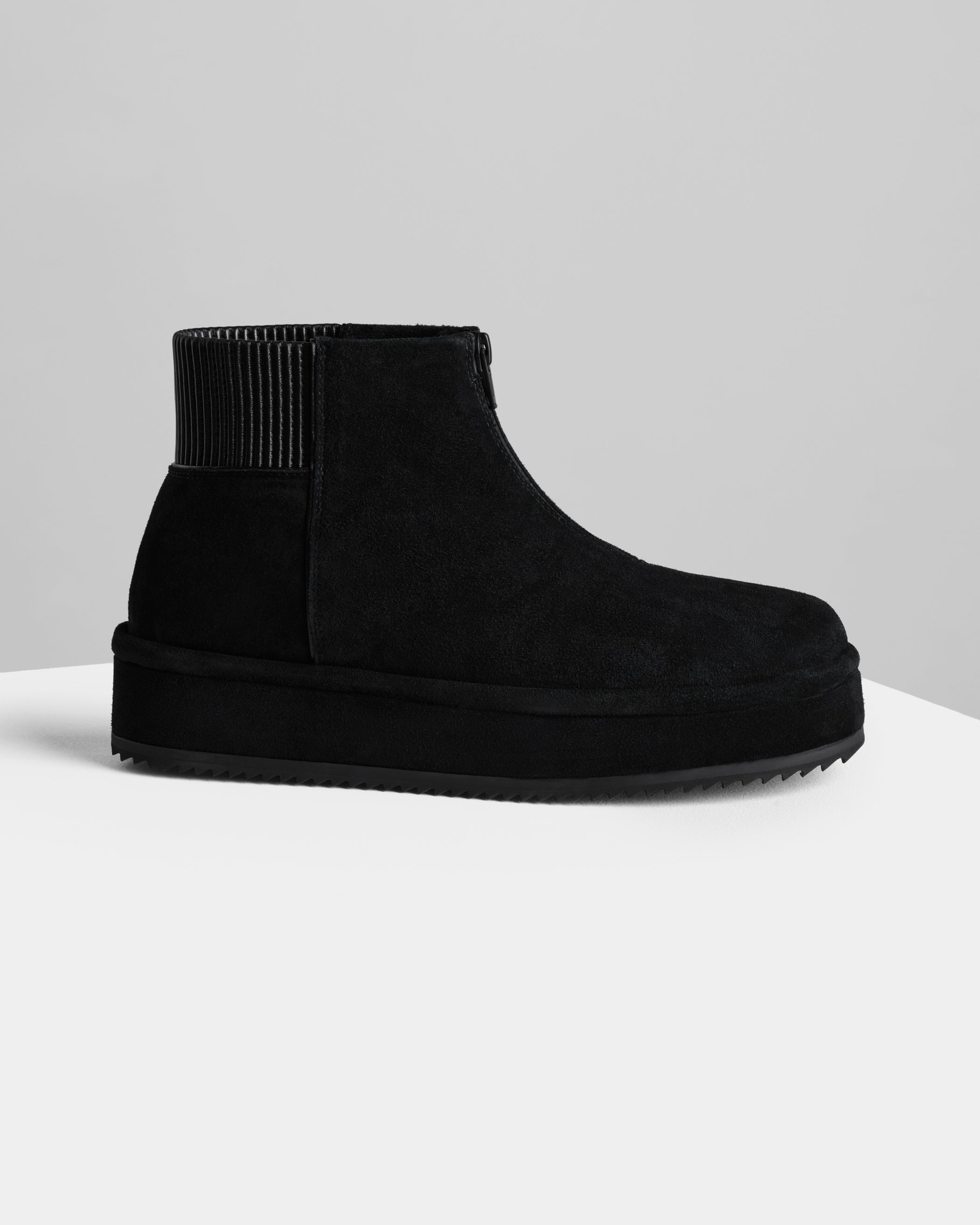 Side view of Bumper Bootie in black leather