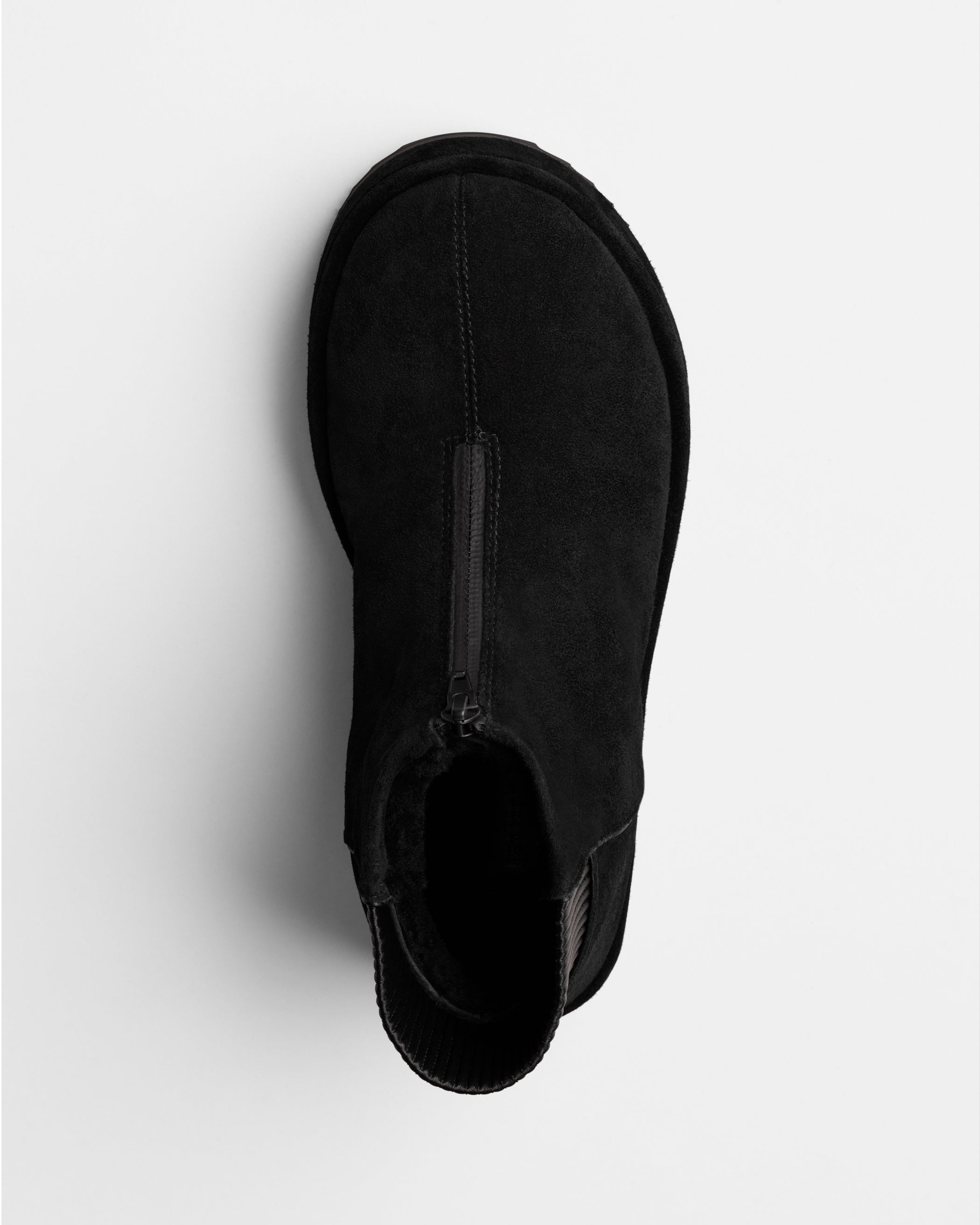 Flat front view of Bumper Bootie in black leather
