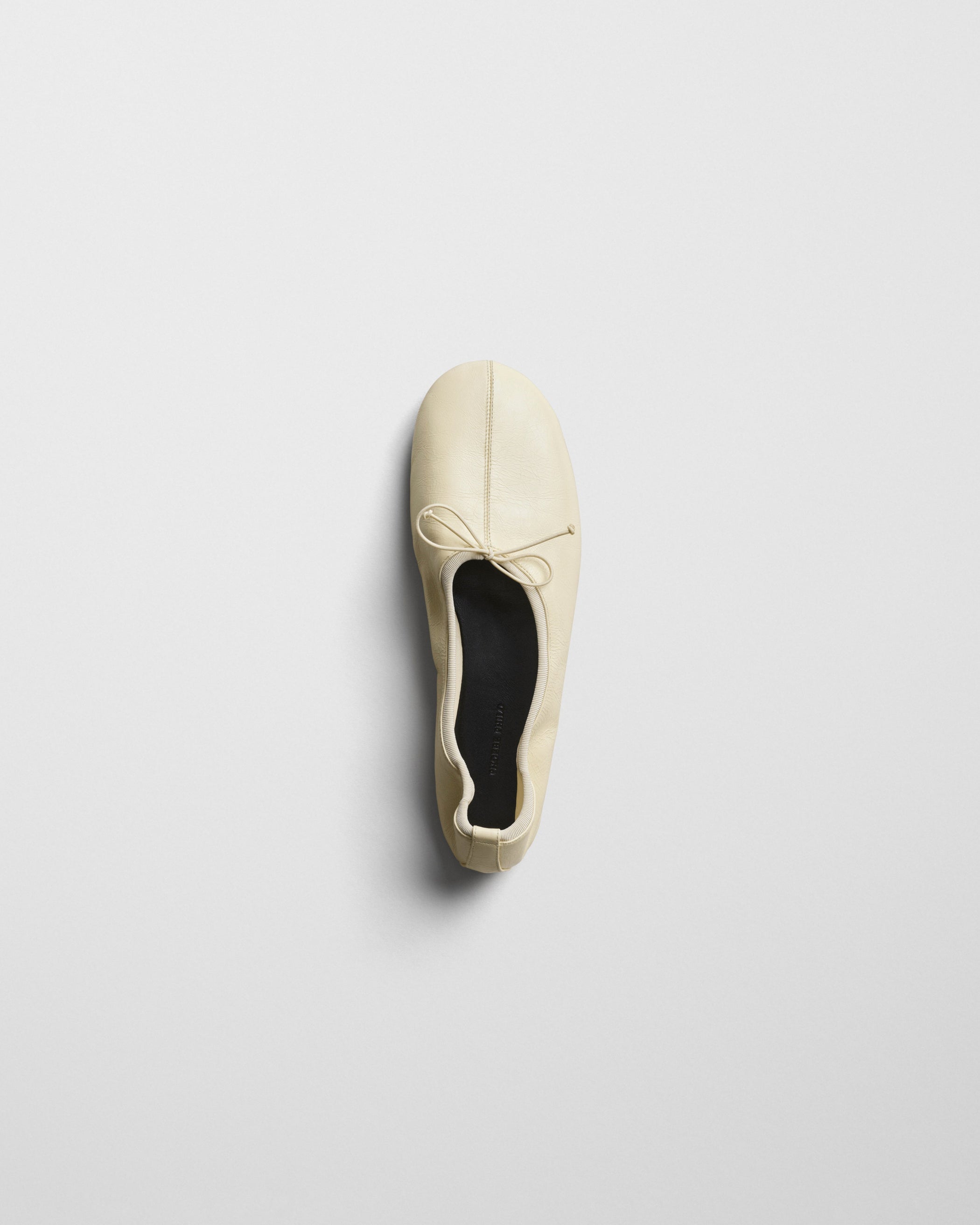 Top view of GATHERED FLAT in stucco leather
