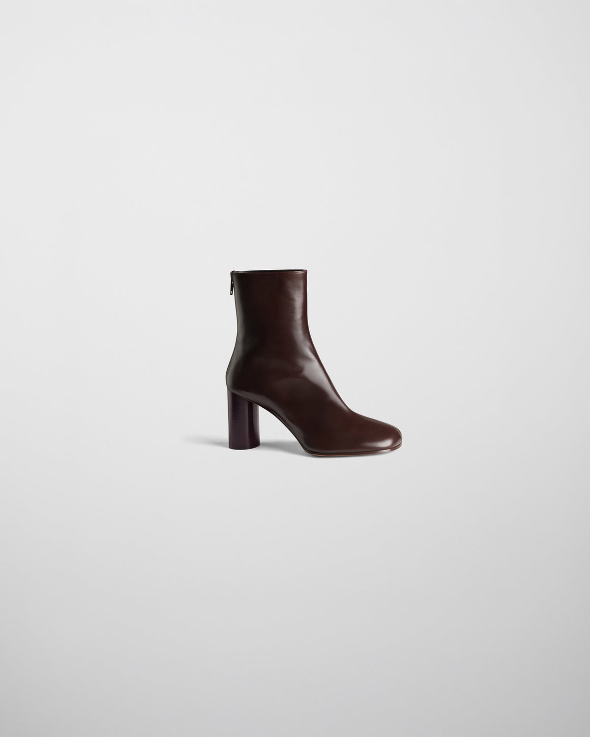 Side view of TUG ANKLE BOOT in plum brown leather